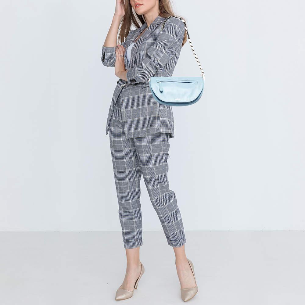 For a look that is complete with style taste and a touch of luxe this Burberry shoulder bag is the perfect addition. Flaunt this beauty on your shoulder at any event and revel in the taste of luxury it leaves you with.