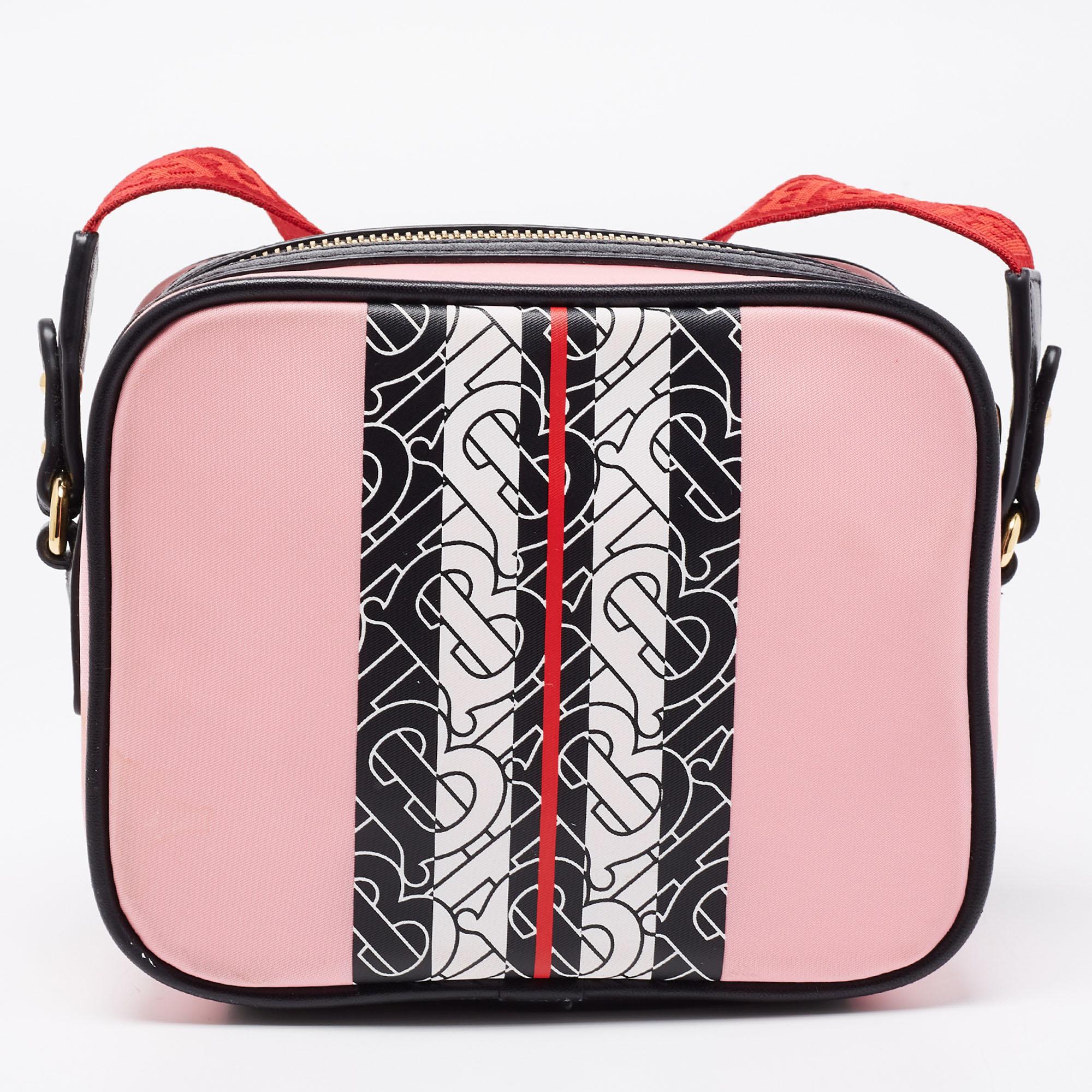 For a look that is complete with style, taste, and a touch of luxe, this Burberry bag is the perfect addition. With a nod to the logomania trend, the creation is created from TB nylon and leather. Style the vibrant camera bag with a plain white