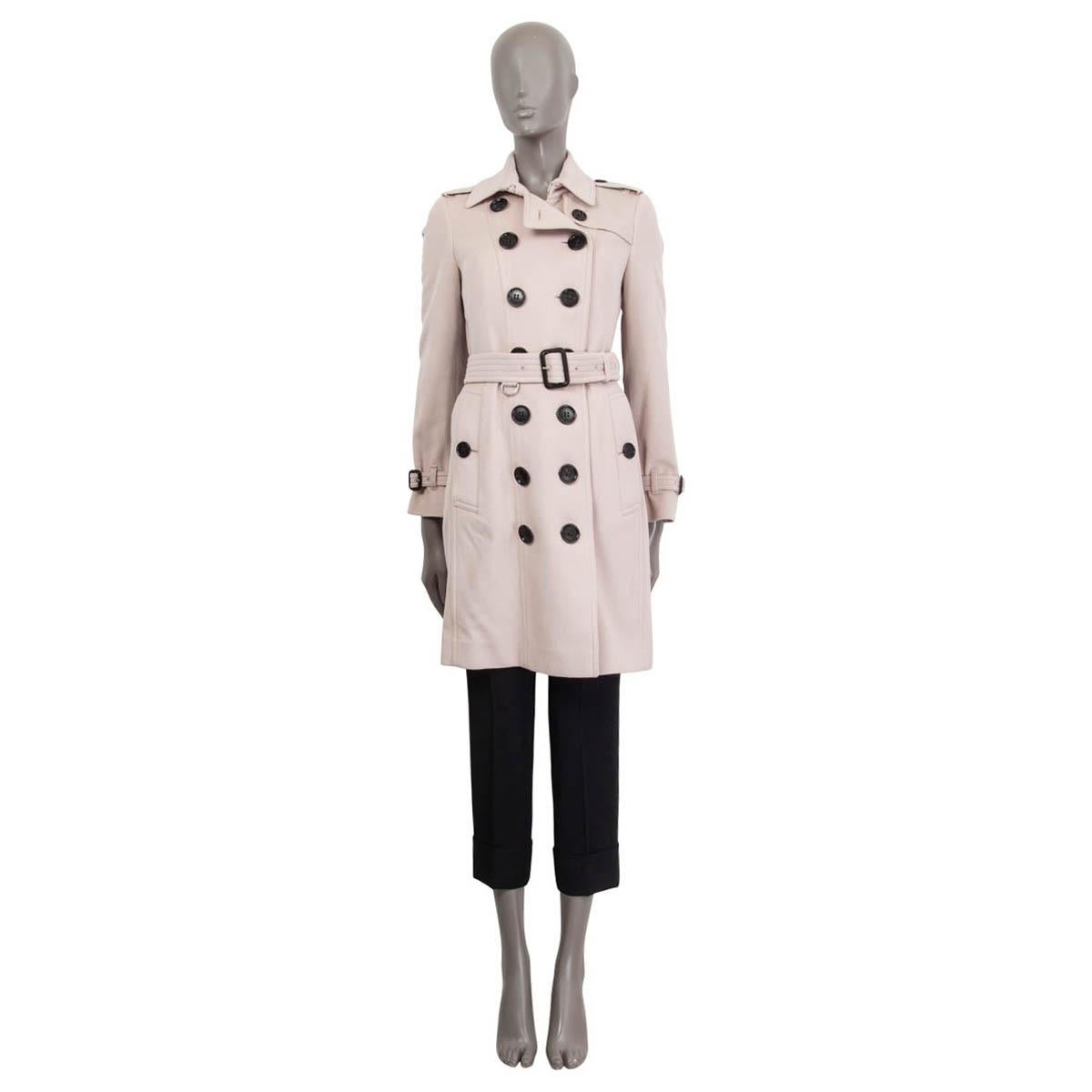 100% authentic Burberry 'The Sandringham' coat in pale rose cashmere (100%). Features epaulettes on the shoulders and the cuffs and a detachable belt. Opens with one hook and seven buttons on the front. Unlined. Has been worn and is in excellent