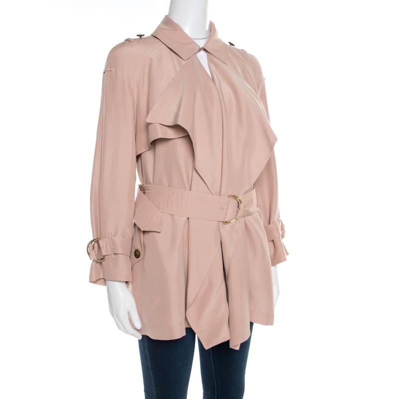 We are smitten by this coat from Burberry! Isn't it stunning? The detailing on it is top class and just takes the beauty of the coat to a higher level. It is tailored from pink silk in a draped design with a belt for added shape.

Includes: The