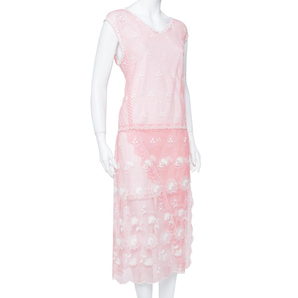 Opt for this piece from Burberry as it is beautifully made and simply pleasing to the eyes. Tailored from quality materials, the dress has a sleeveless design, embroidered lace overlay, and faux wrap detail. It will work well with flats and heels as