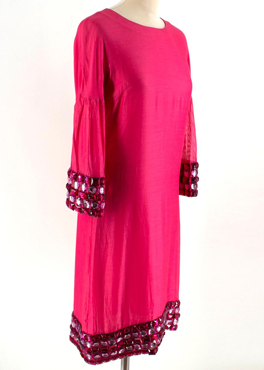 Burberry Pink Jewelled Midi Dress

-Pink, cotton blend 
-Long-sleeve
-Jewels on cuffs and trimming
-Bell sleeves
-Round neckline 
-concealed side zip
-Lined

Please note, these items are pre-owned and may show some signs of storage, even when unworn
