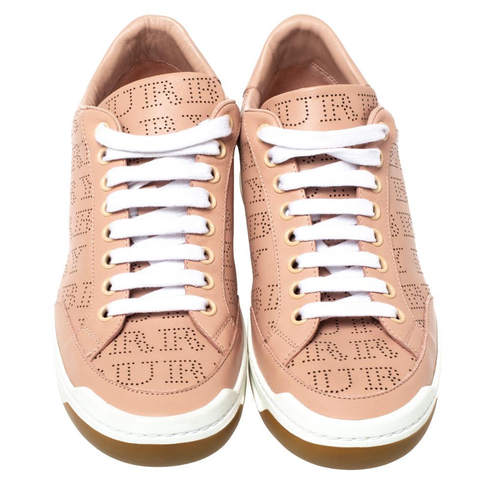 Burberry's iconic logo comes alive in these Westford sneakers, in a refreshing perforated style. They are crafted from leather in a low top silhouette featuring a pink hue all over. A sturdy built, lace-ups on the vamps and snug insoles make this
