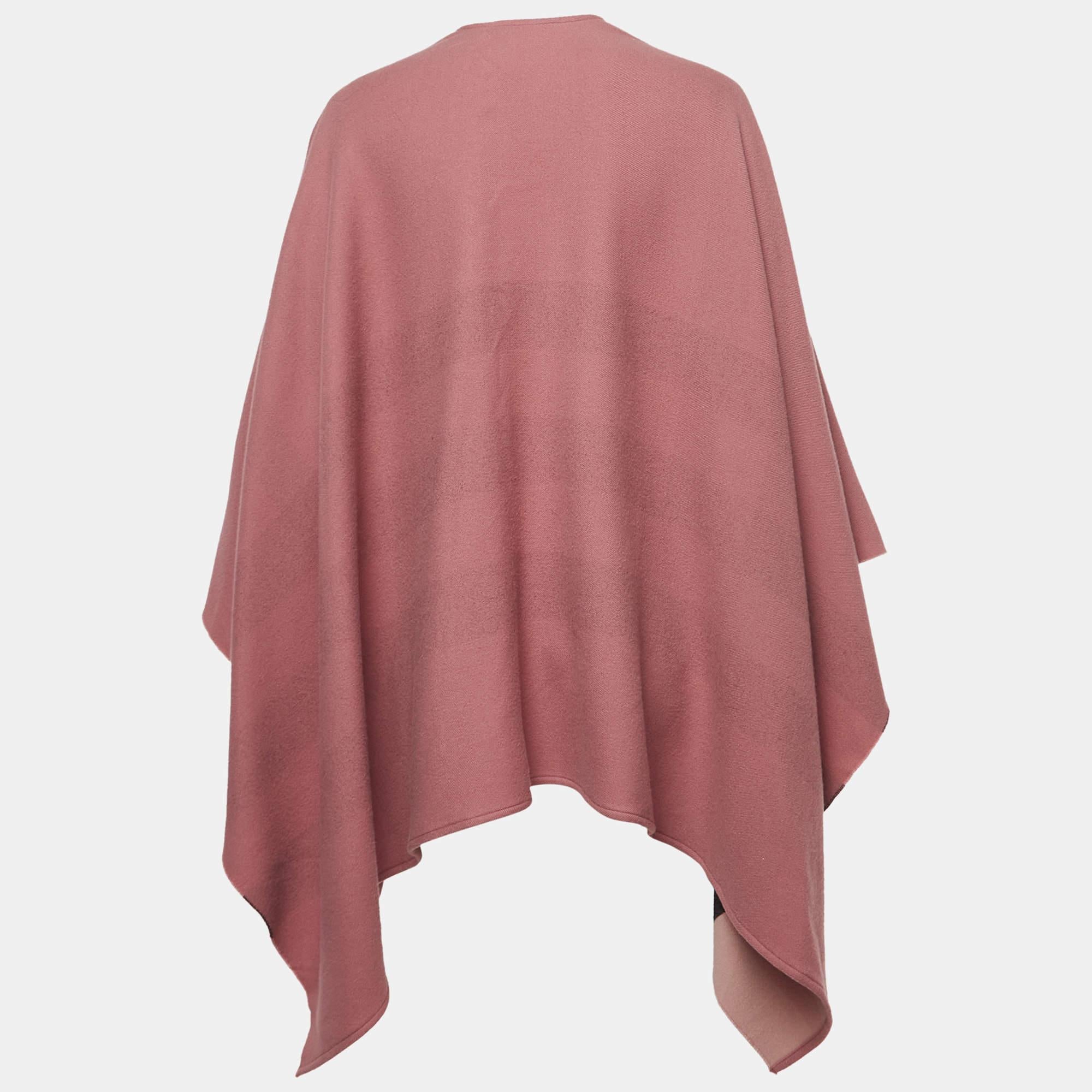 Flattering and feminine, this poncho definitely needs to be on your wishlist! It is made of smooth cashmere and flaunts a comfy silhouette. Pair it with jeans and block heels for a fashionable get-together.

Includes
The Luxury Closet Packaging