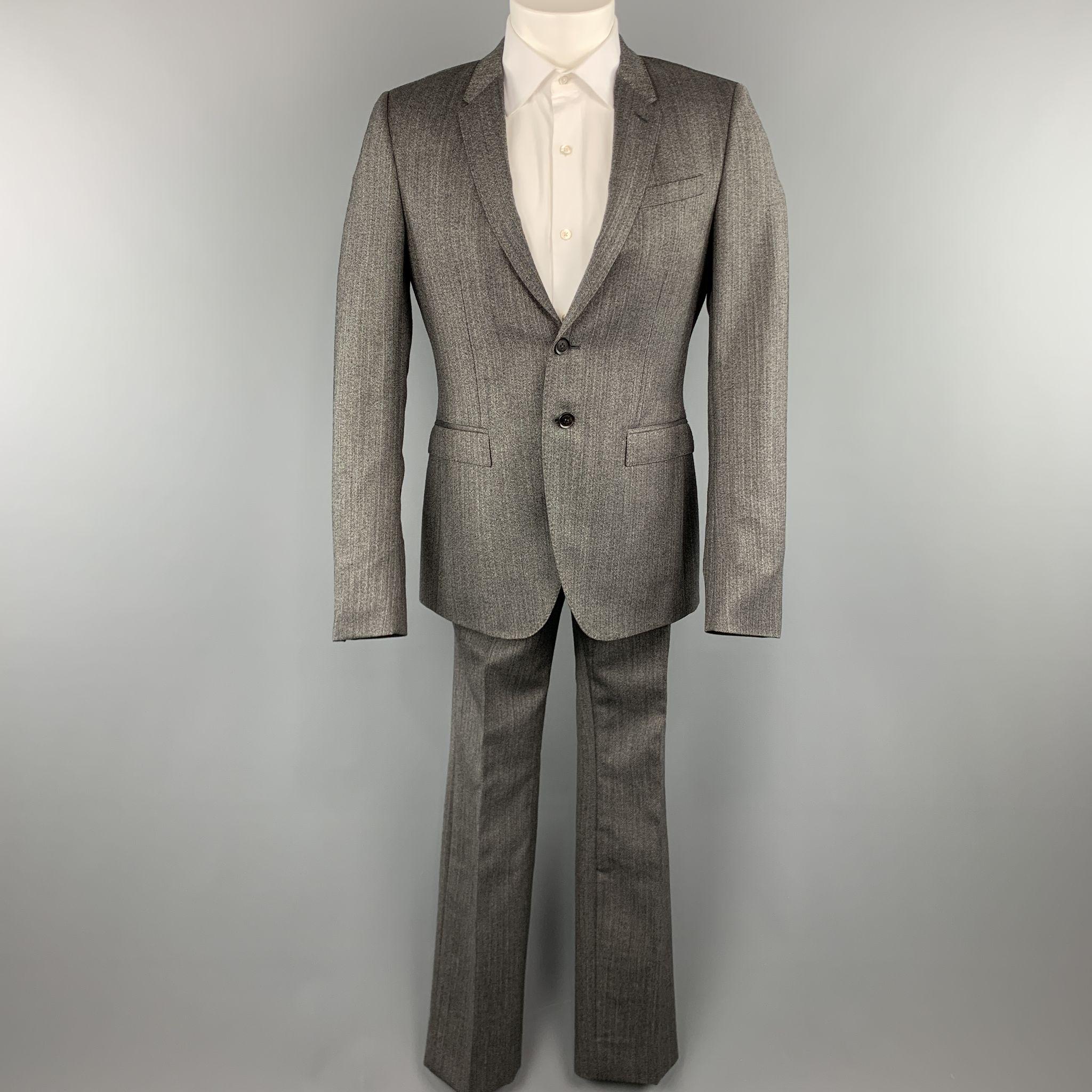 BURBERRY PRORSUM suit comes in a grey herringbone and includes a single breasted, two button sport coat with notch lapel and matching front trousers. 

Excellent Pre-Owned Condition.
Marked: 50

Measurements:

-Jacket
Shoulder: 16.5 in. 
Chest: 40