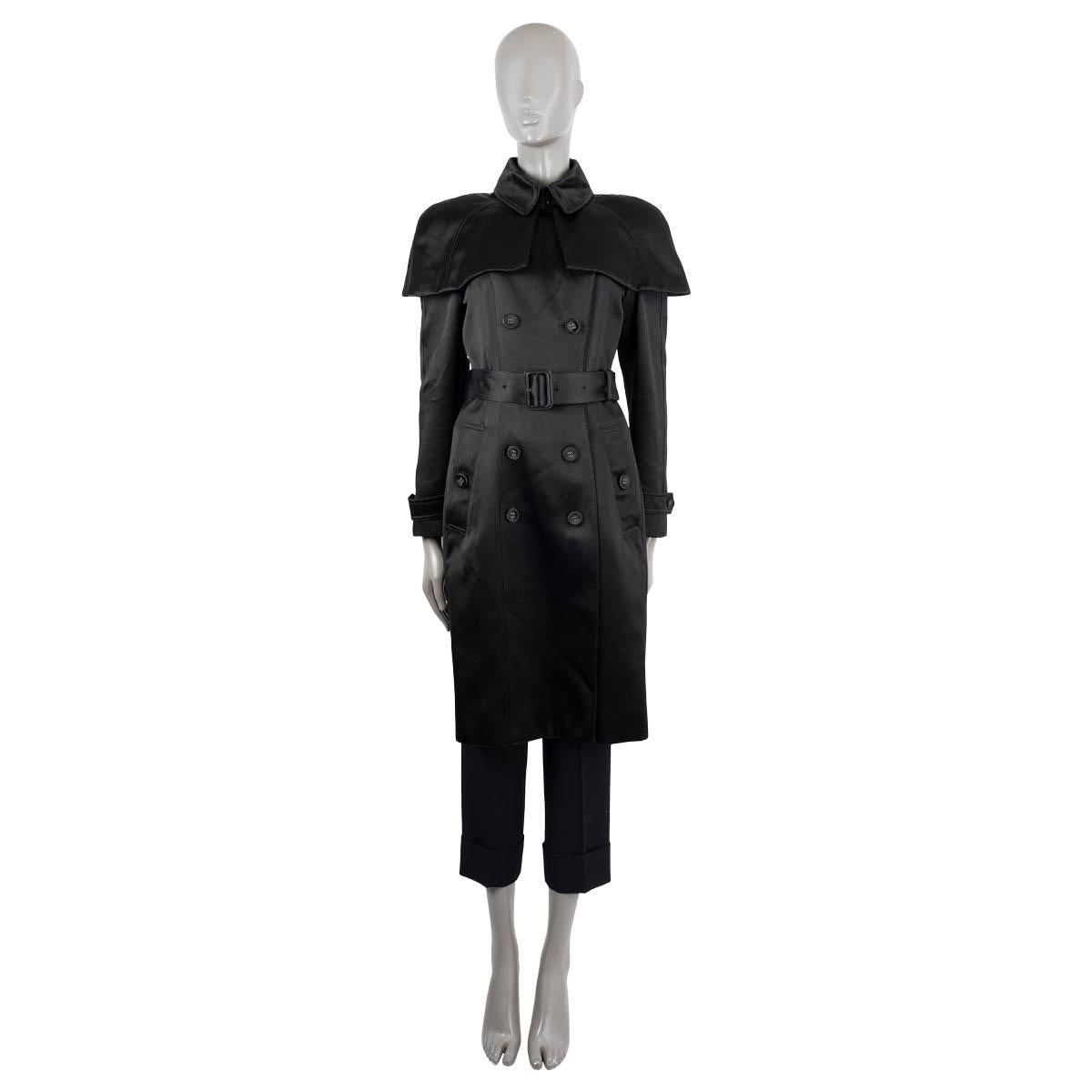 100% authentic Burberry double breasted caped trench coat in black  viscose (68%) and silk (32%) Duchess satin. Features epaulettes on the shoulders and cuffs and a detachable belt. Closes with one hook and one button at the neck and buttons on the