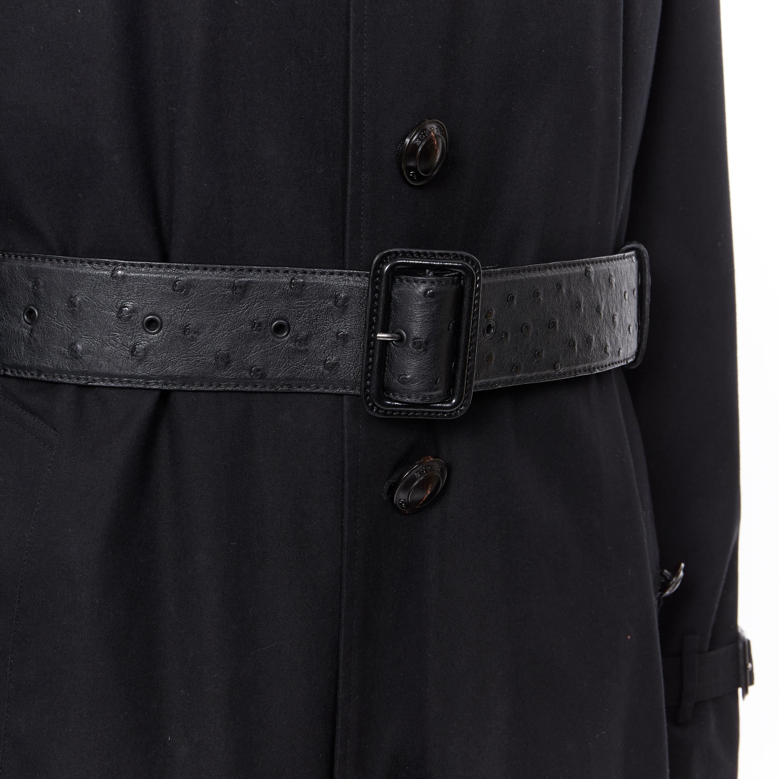 BURBERRY PRORSUM black cotton removable rabbit fur lining ostrich belt trench L 
Reference: CNLE/A00094B
Brand: Burberry 
Designer: Christopher Bailey 
Material: Cotton 
Color: Black 
Pattern: Solid 
Closure: Button 
Extra Detail: Detachable rabbit