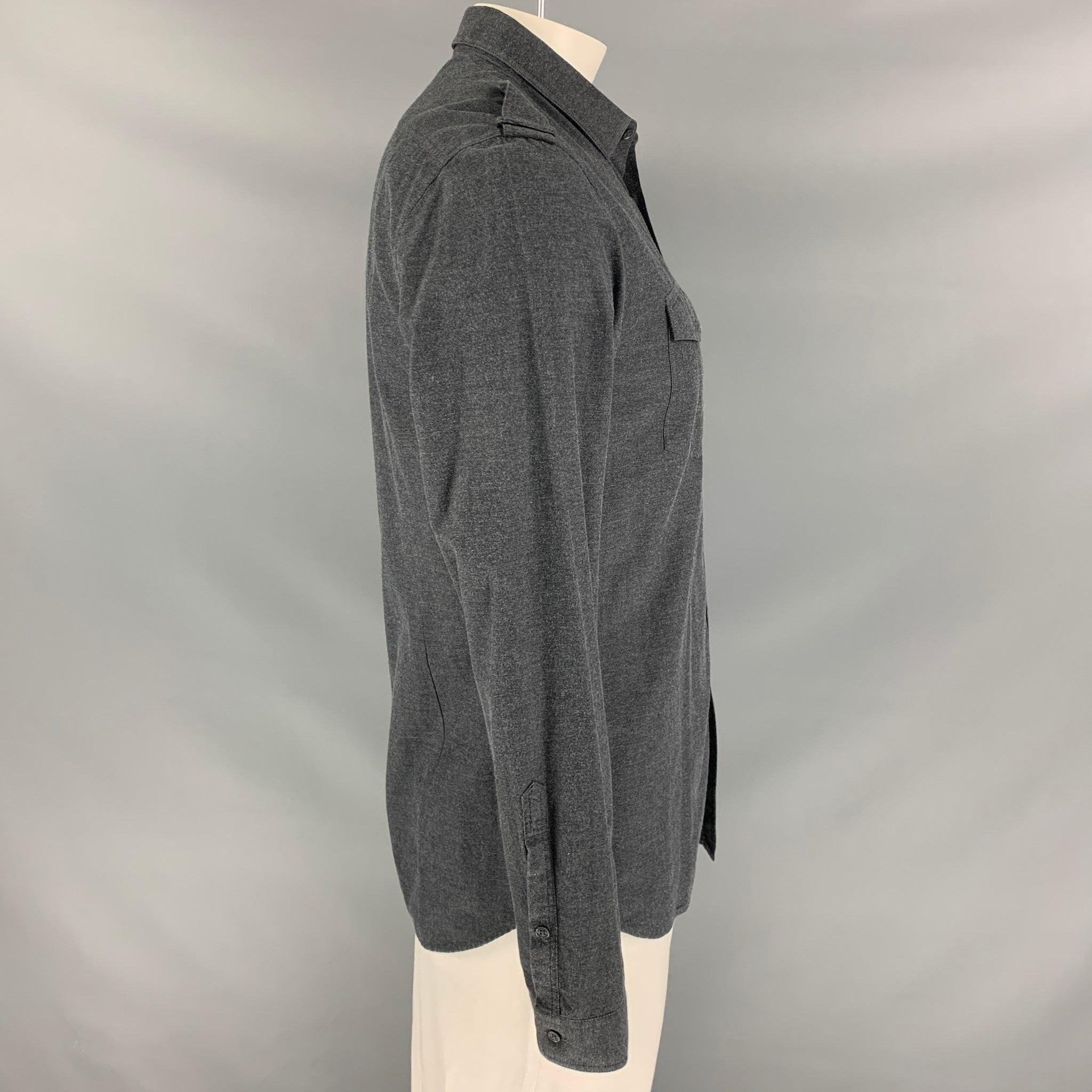 BURBERRY PRORSUM Fall 2010 long sleeve shirt comes in a gray cotton featuring epaulettes, front pockets, spread collar, and a buttoned closure. Made in Italy.Very Good
Pre-Owned Condition. 

Marked:   18.5/42 

Measurements: 
 
Shoulder: 18.5 inches