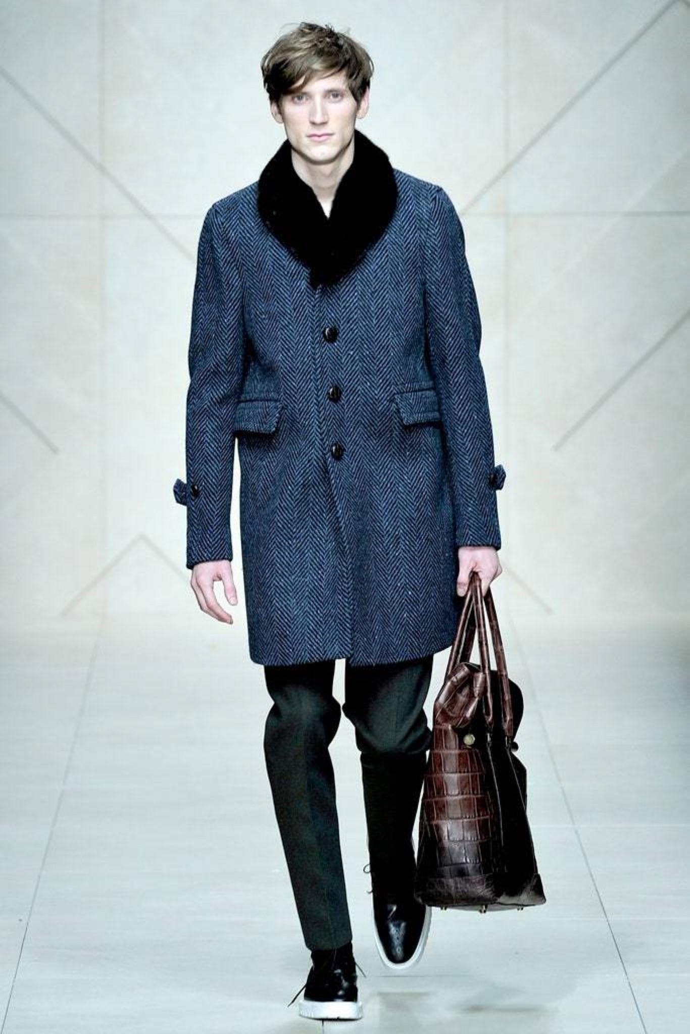 Burberry Prorsum Fall 2011 Coat by Christopher Bailey Look 49.  Features a heavy construction, removable mink collar, details in calf leather, diamond stitched interior with internal compartment pockets, single vent. Made in Italy.

Excellent