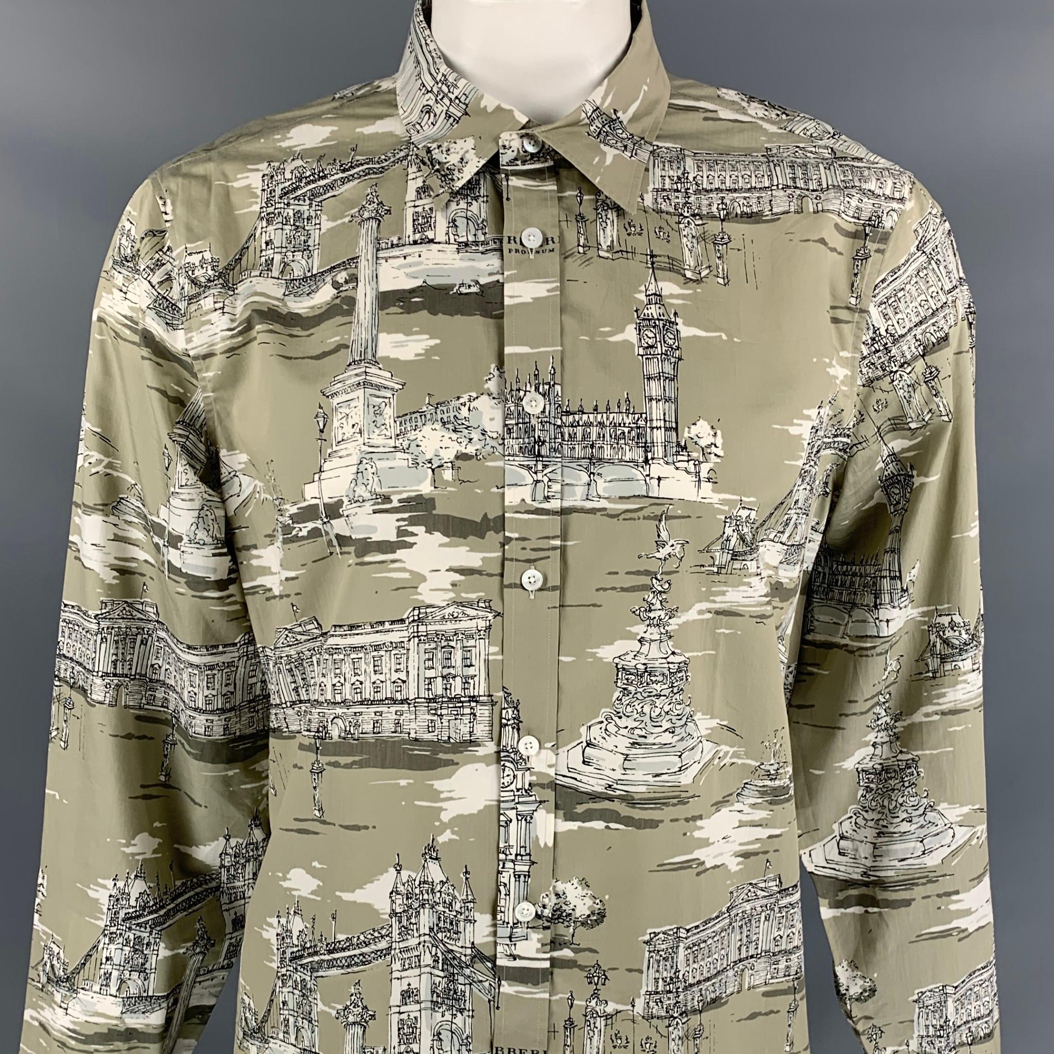 BURBERRY PRORSUM Fall 2014 long sleeve shirt comes in a taupe & beige london landmark print cotton featuring a pointed collar and a button up closure. Made in Italy.

Very Good Pre-Owned Condition.
Marked: 17.5/44

Measurements:

Shoulder: 19.5