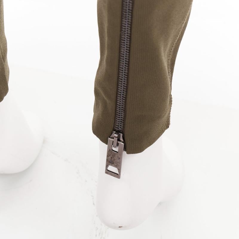 BURBERRY PRORSUM khaki green zip back hem stretch skinny pants IT40 S
Reference: NKLL/A00602
Brand: Burberry
Collection: Prorsum
Material: Rayon
Color: Green
Pattern: Solid
Closure: Zip
Extra Details: Zippers at side of waist and back of hems.
Made