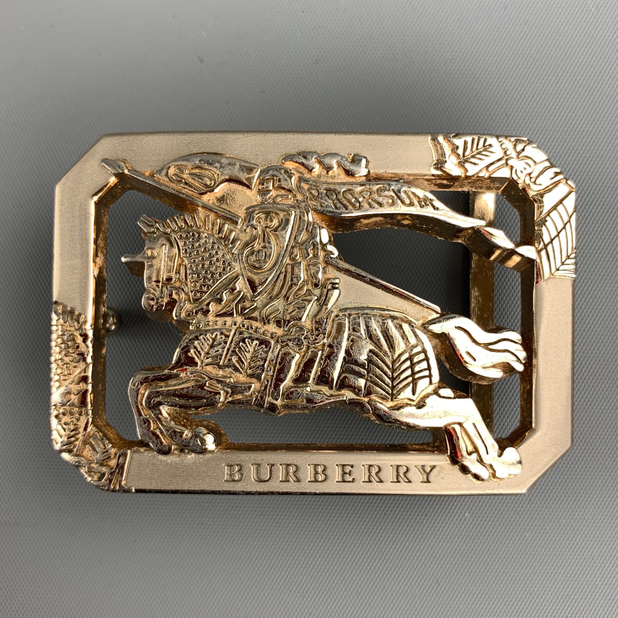 BURBERRY PRORSUM belt buckle comes in a silver tone metal featuring a 
