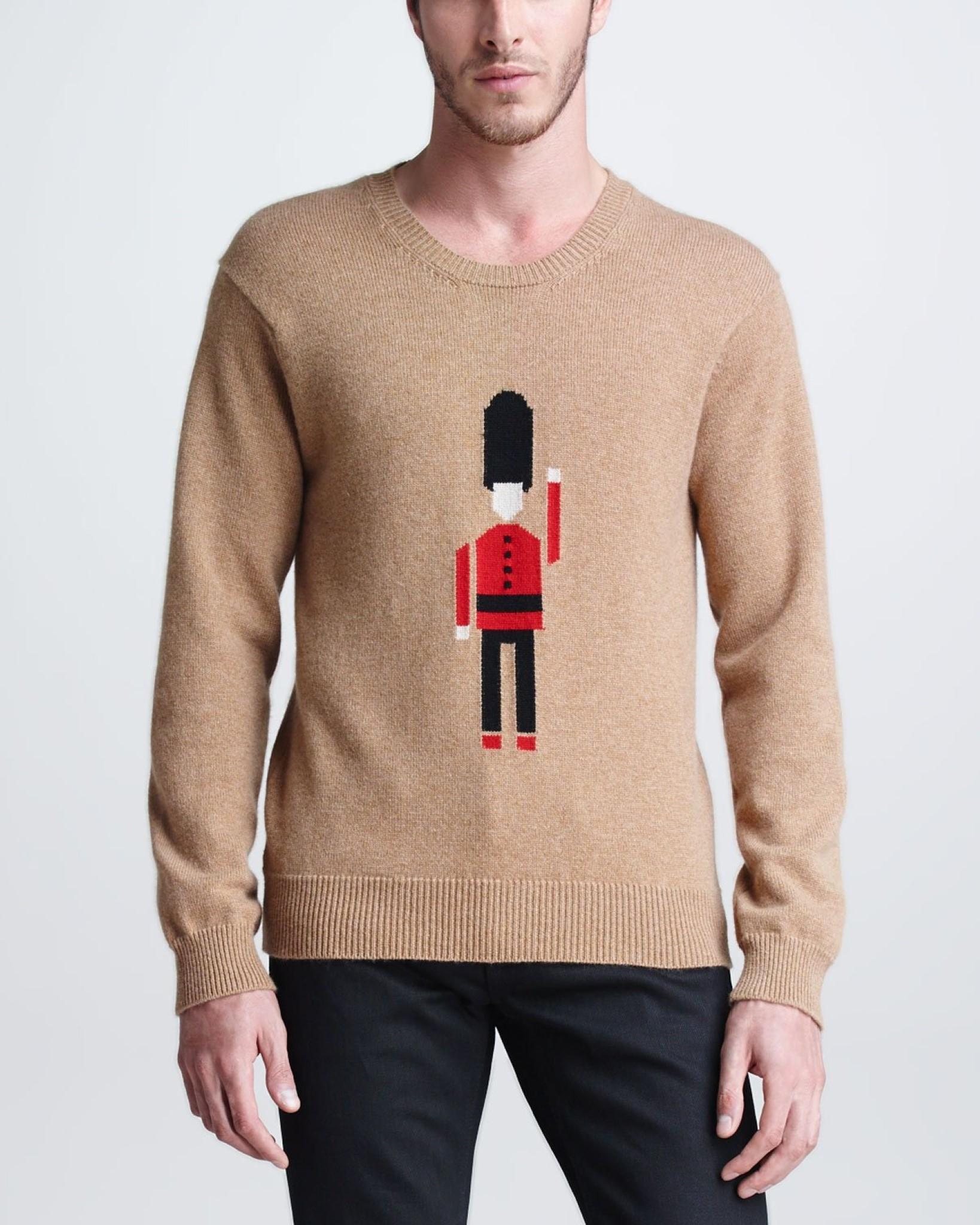 BURBERRY PRORSUM Pre-Fall 2013 sweater comes in a tan & red cashmere with a front 'Solider Guard Inarsia' design featuring a ribbed hem and a crew-neck. Made in United Kingdom. 

Very Good Pre-Owned Condition.
Marked: L

Measurements:

Shoulder: 19