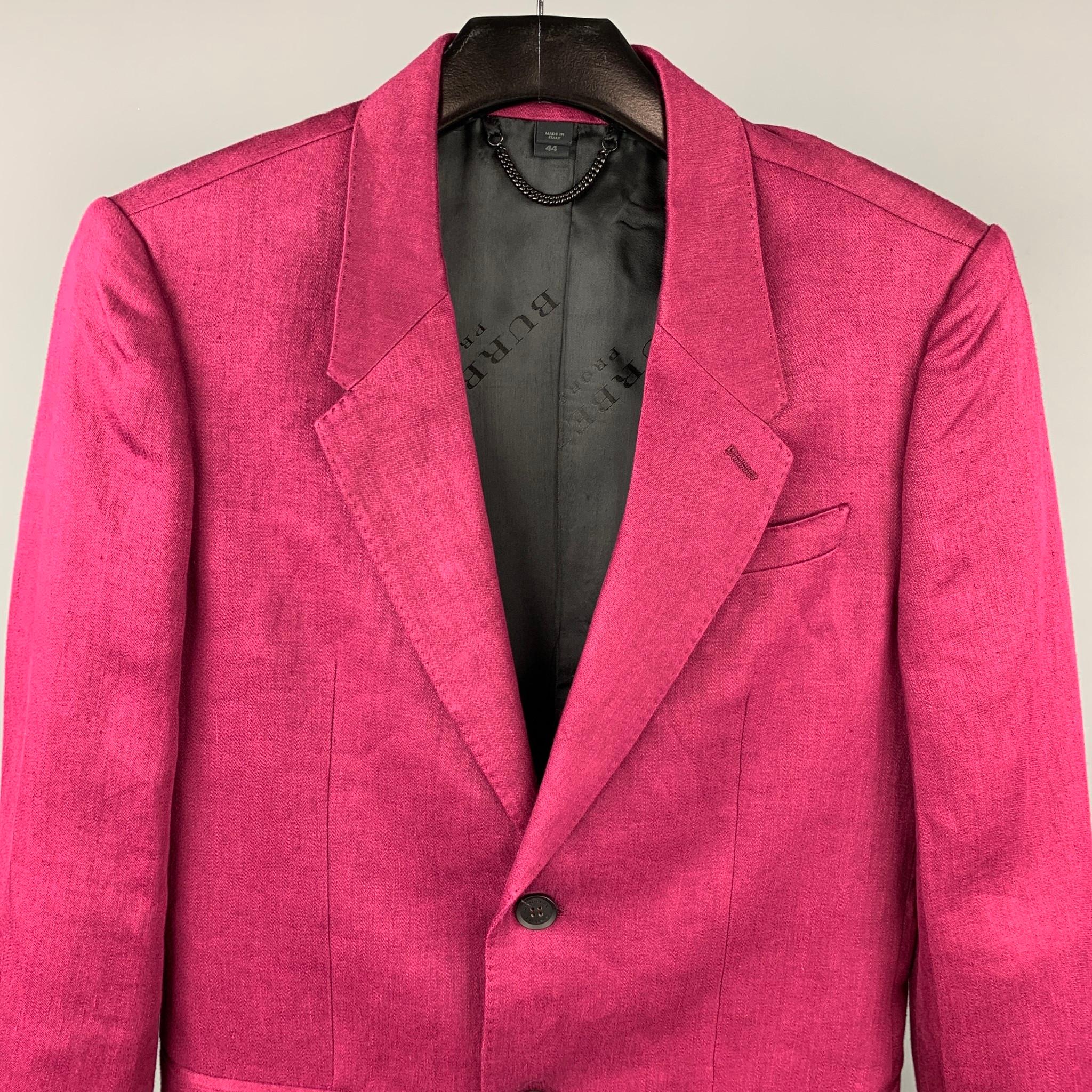 BURBERRY PRORSUM S/S 15 suit comes in a burgundy line with a full monogram print liner and includes a single breasted, two button sport coat with a notch lapel and matching flat front trousers. Made in Italy.

Very Good Pre-Owned Condition.
Marked: