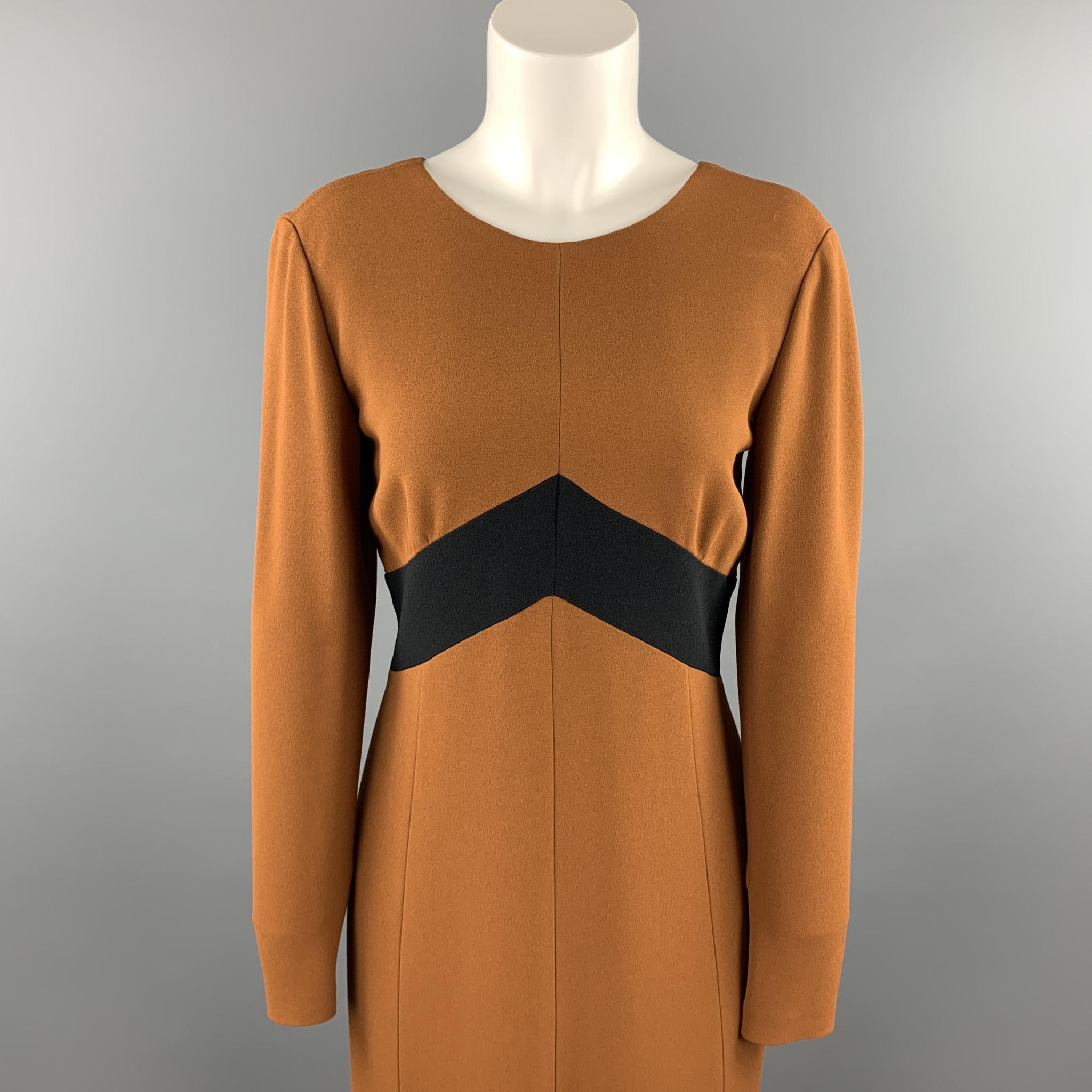 BURBERRY PRORSUM long sleeve dress comes in a rust brown crepe with a black panel detail featuring an a-line style, single vent, and a back zip up closure. Made in Italy.

Excellent Pre-Owned Condition.
Marked: IT 44
Original Retail Price: