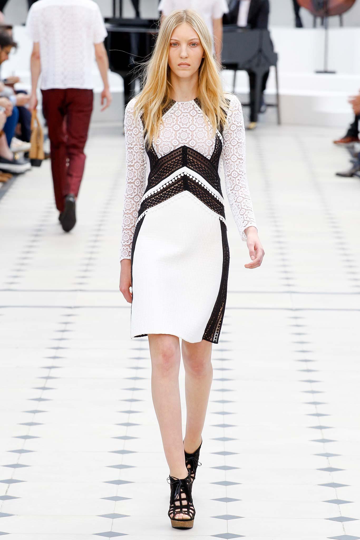 Burberry Prorsum Resort 2016 White & Black Patterned Shift Mini Dress by Christopher Bailey shown during the menswear 2016 spring presentation. Features Lace Trim Embellishment, Long Sleeve with Crew Neck, Concealed Zip Closure at Back. Made in