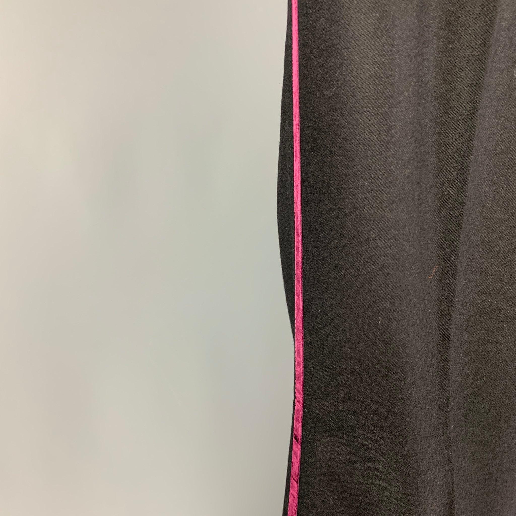 BURBERRY PRORSUM dress pants comes in a black wool featuring a burgundy velvet trim, flat front, and a zip fl closure. Made in Italy.
Very Good
Pre-Owned Condition. 

Marked:   50 

Measurements: 
  Waist: 32 inches  Rise: 10.5 inches  Inseam: 35