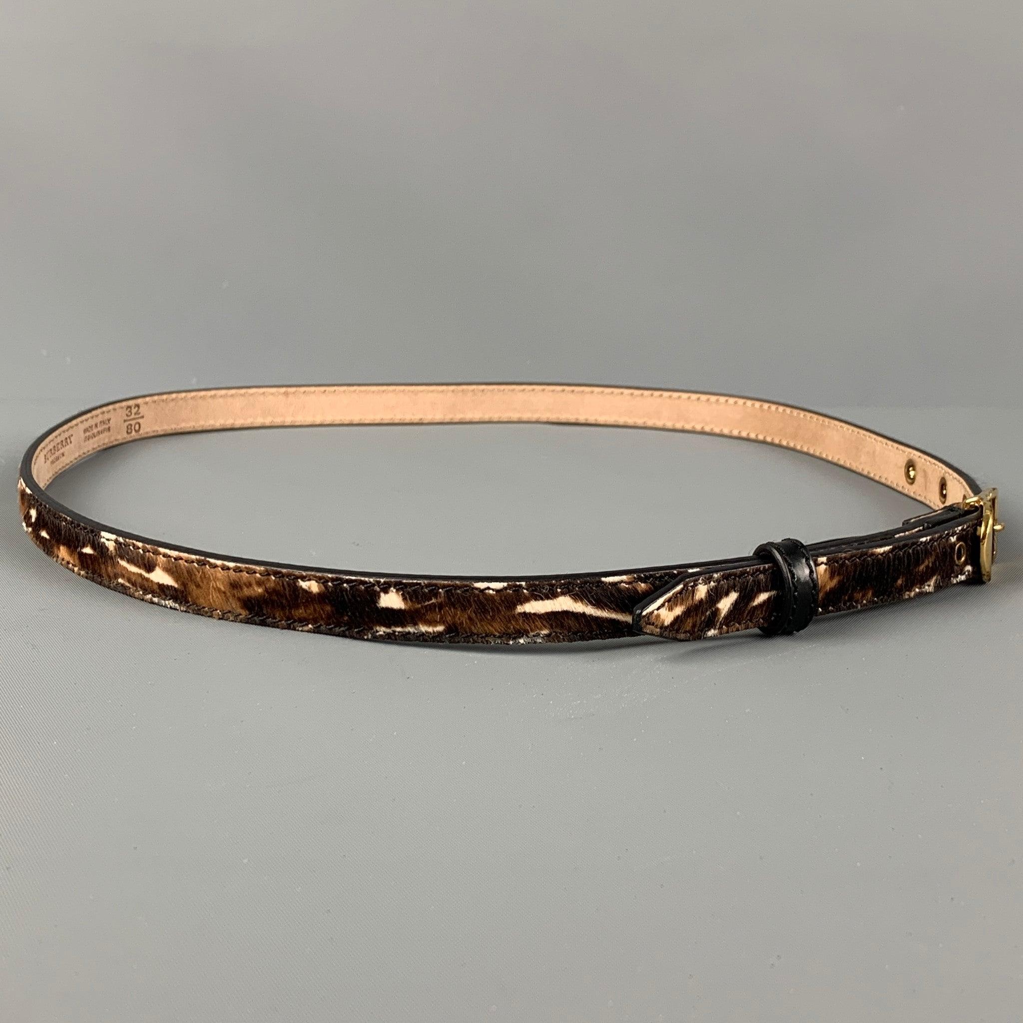 BURBERRY PRORSUM belt comes in a brown & white animal print pony hair featuring a gold tone buckle closure. Made in Italy.
Very Good
Pre-Owned Condition. 

Marked:   32/80Length: 37.5 inches  Width: 0.5 inches  Fits: 29 inches  - 33 inches  Buckle: