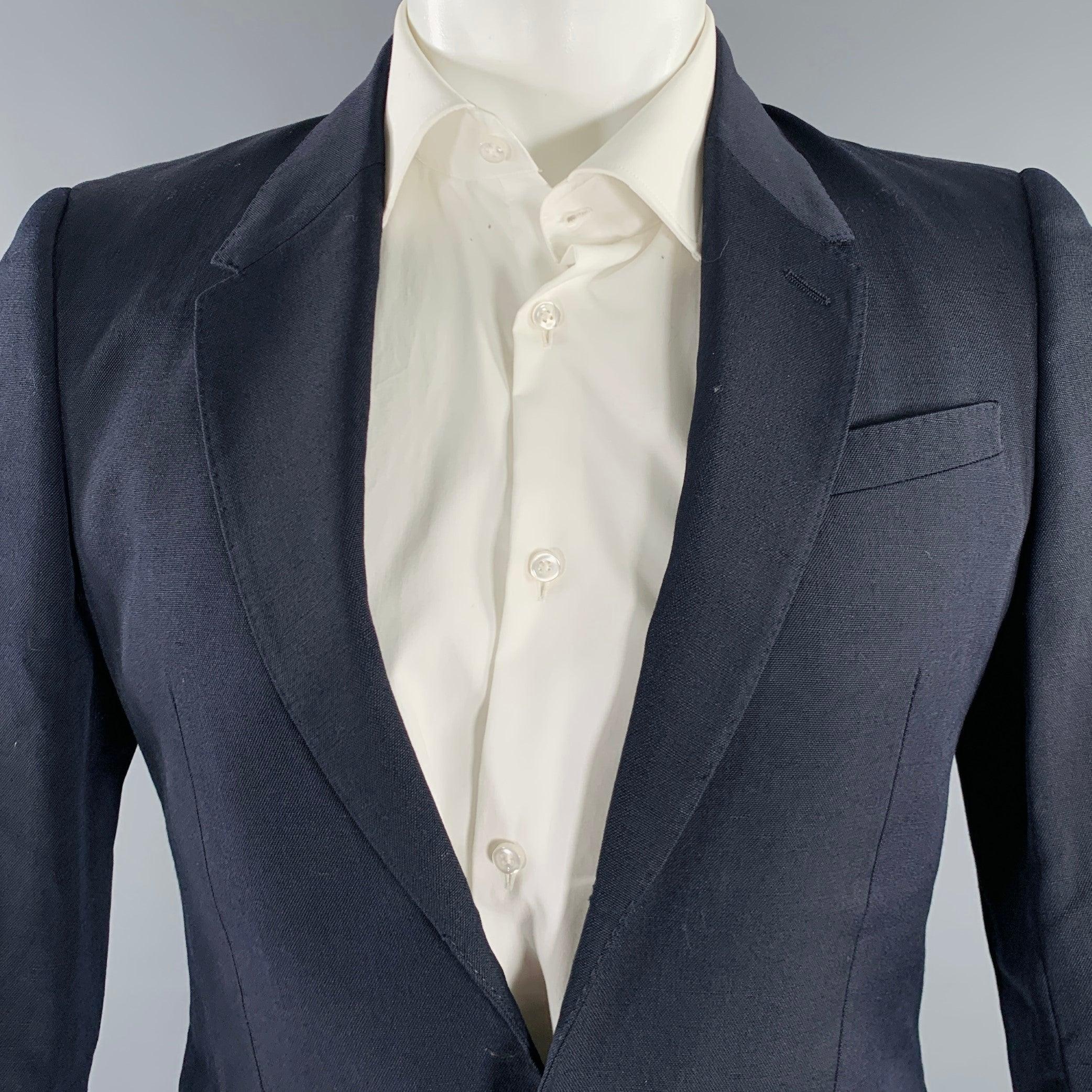 BURBERRY PRORSUM sport coat
in a black virgin wool mohair blend featuring a notch lapel, double vented back, and double button closure. Made in Italy.Very Good Pre-Owned Condition. Top button has been removed. 

Marked:   size not marked.