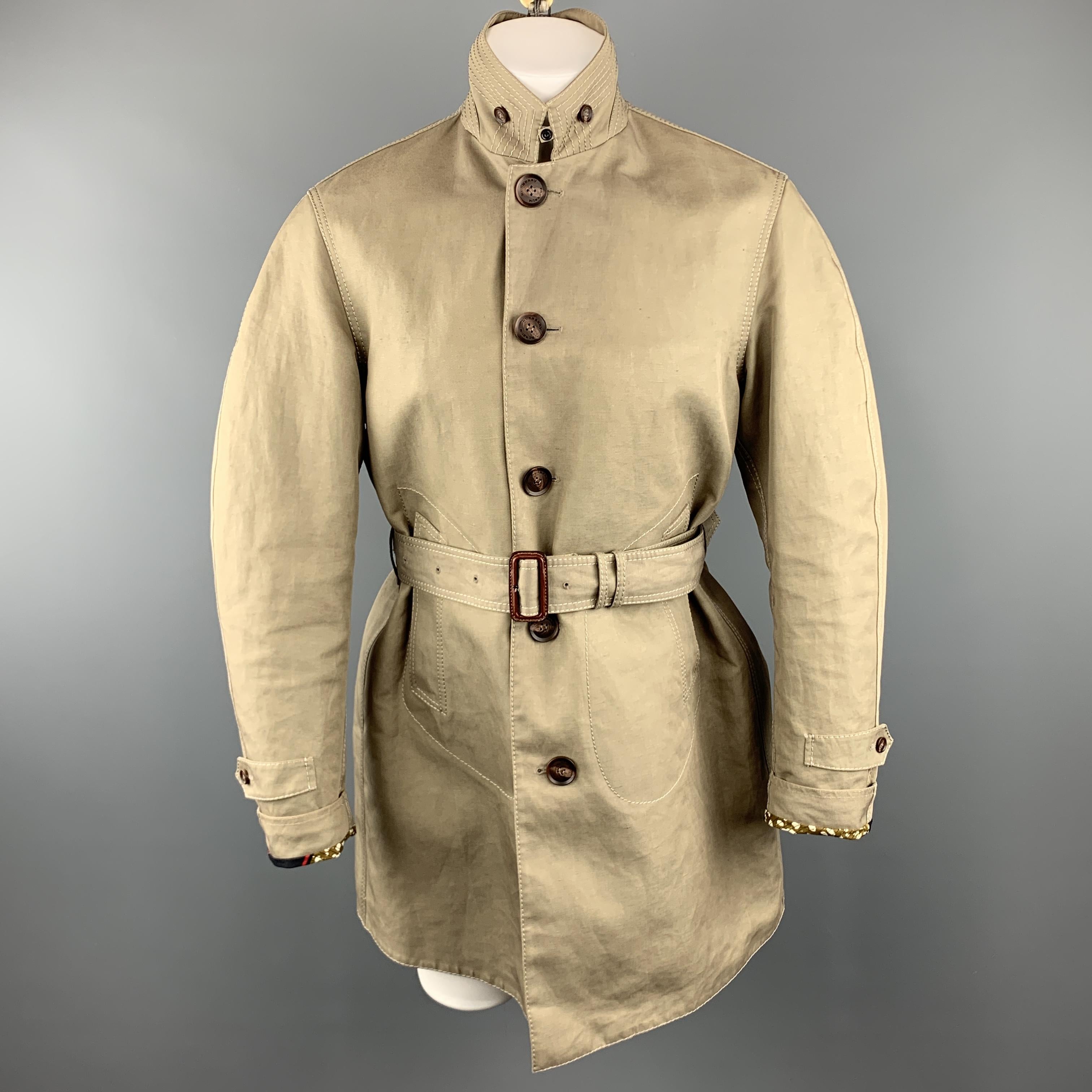 BURBERRY PRORSUM trench coat comes in a khaki cotton & linen featuring a belted style, contrast stitching, slit pockets, and a button closure. Made in Italy.
 
Excellent Pre-Owned Condition.
Marked: IT 48
 
Measurements:
 
Shoulder: 18.5 in.
Chest: