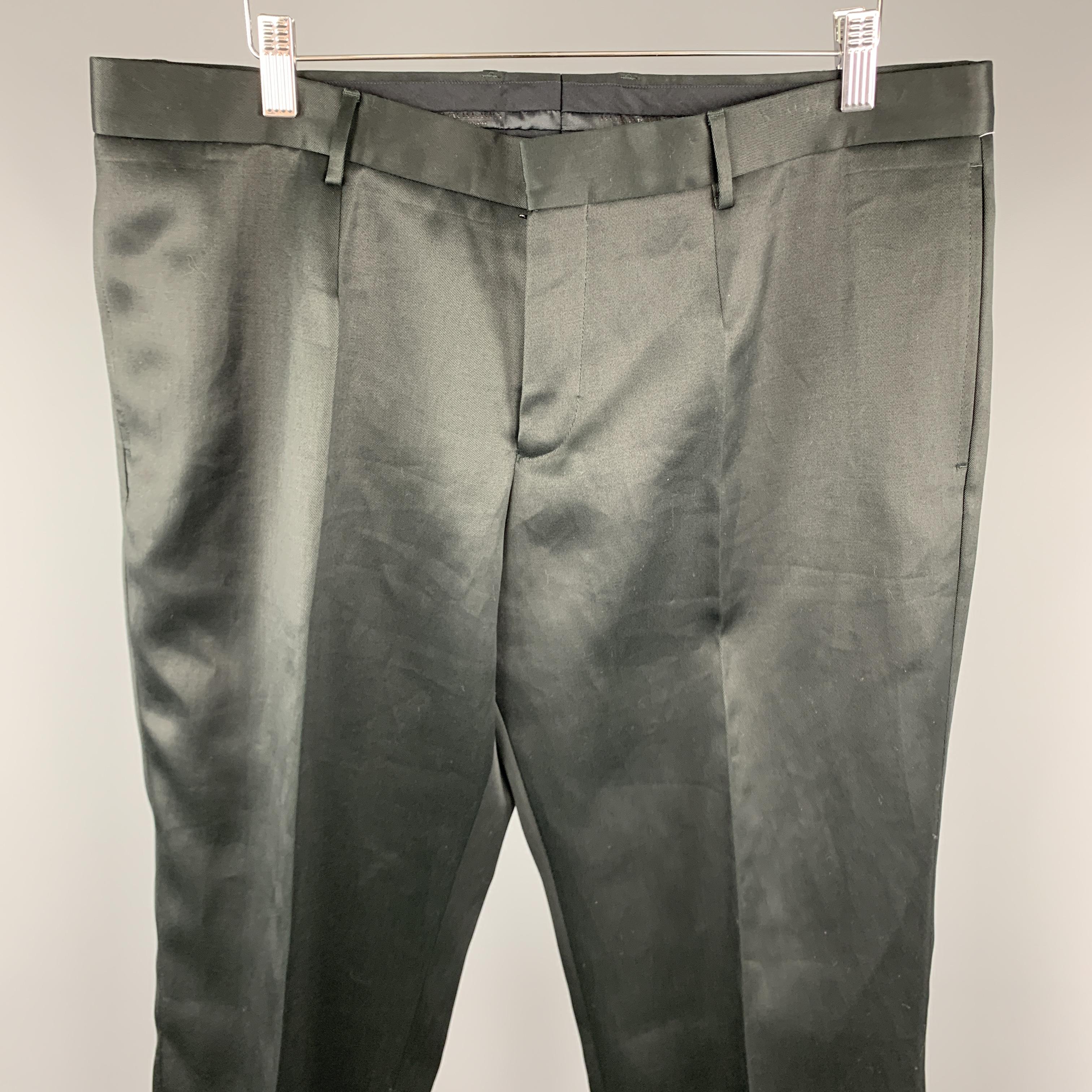 BURBERRY PRORSUM dress pants come in shiny mercerized cotton twill with a flat front and unhemmed leg.Made in Italy.

Very Good Pre-Owned Condition.
Marked: IT 54

Measurements:

Waist: 38 in.
Rise: 10.5 in.
Inseam: 39 in.
