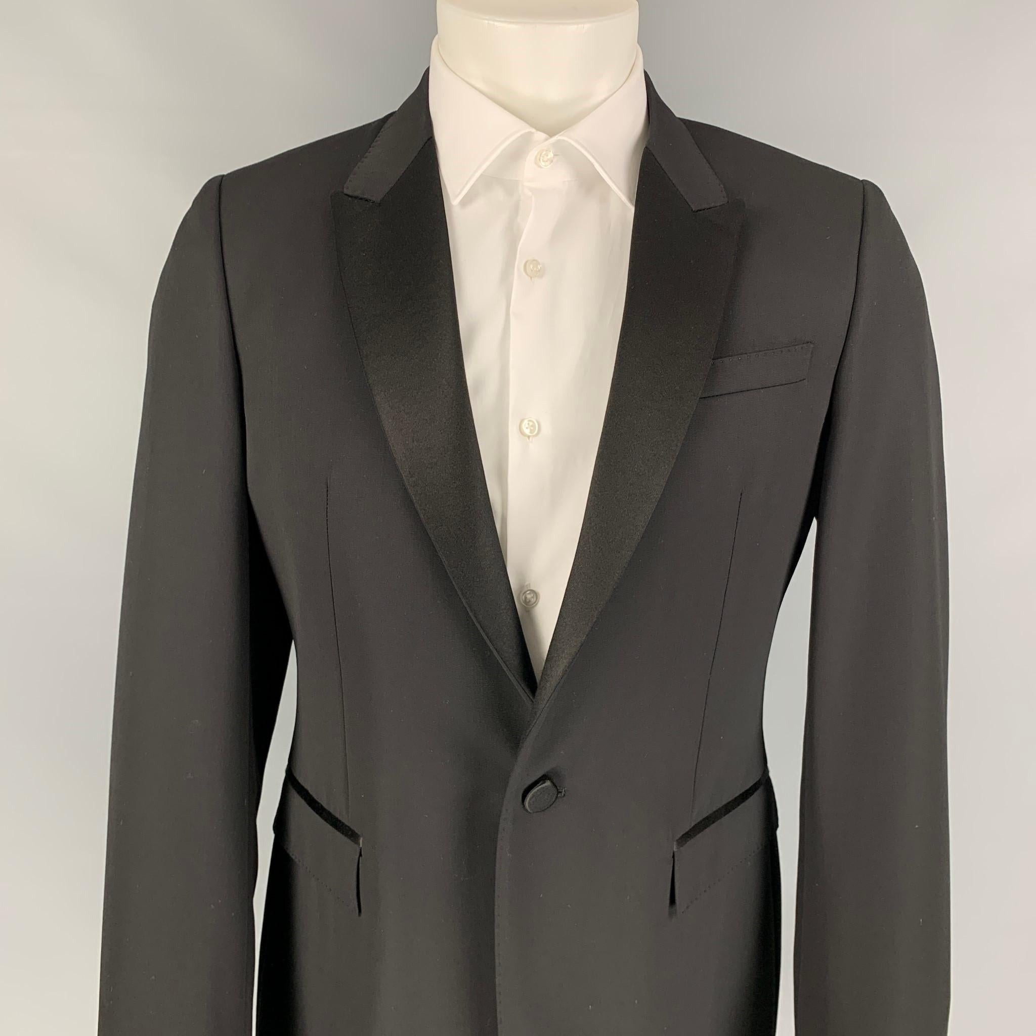 BURBERRY PRORSUM sport coat comes in a black wool with a full liner featuring a peak lapel, flap pockets, double back vent, and a single button closure. Made in Italy.

New With Tags. 
Marked: 40
Original Retail Price: