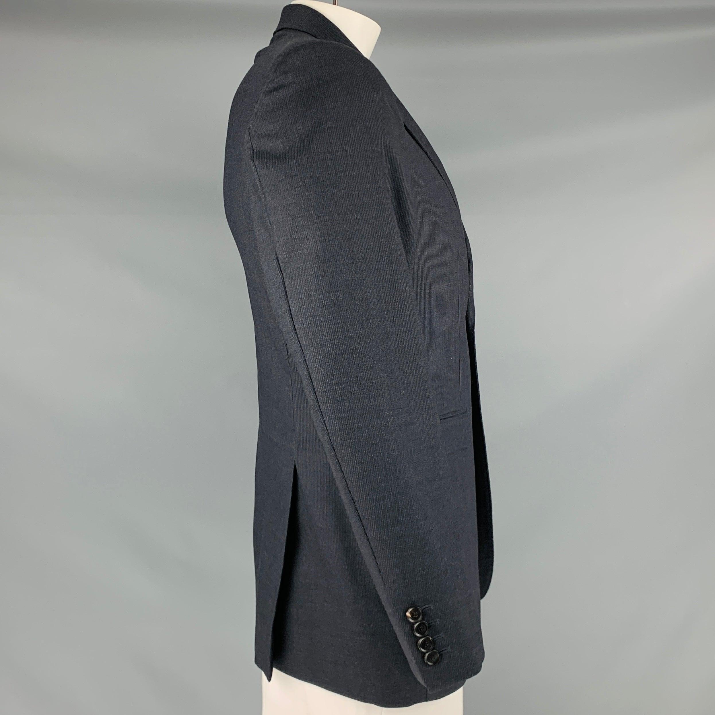 BURBERRY PRORSUM sport coat
in a grey virgin wool fabric featuring a textured style, notch lapel, and double button closure. Made in Italy.Very Good Pre-Owned Condition. Minor signs of wear. 

Marked:   52 

Measurements: 
 
Shoulder: 16.5 inches