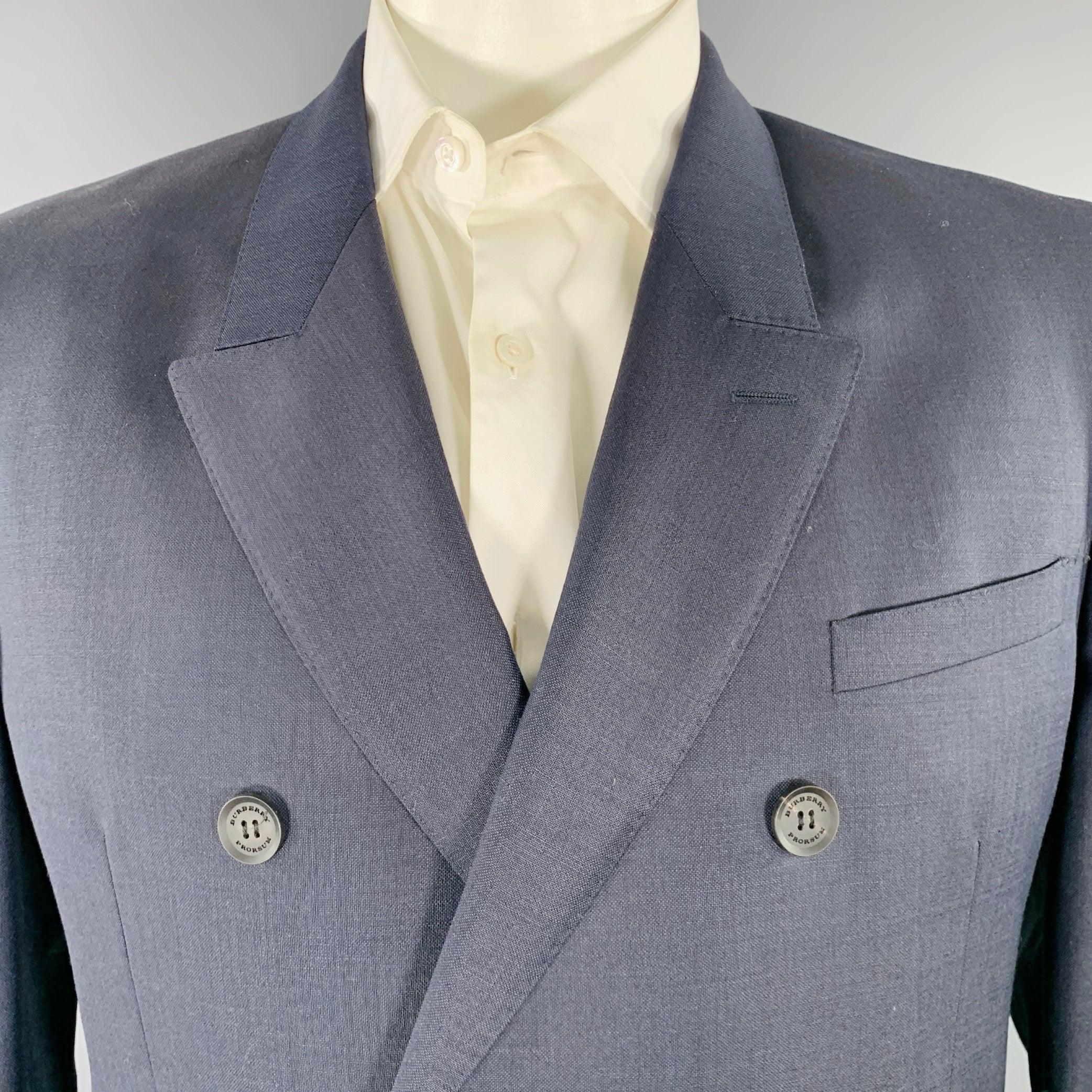 BURBERRY PRORSUM by Christopher Bailey sport coat
in an indigo blue mohair wool blend fabric featuring a double breasted style, peak lapel, double vented back, and double button closure. Made in Italy.New with Tags. 

Marked:   IT 54 

Measurements:
