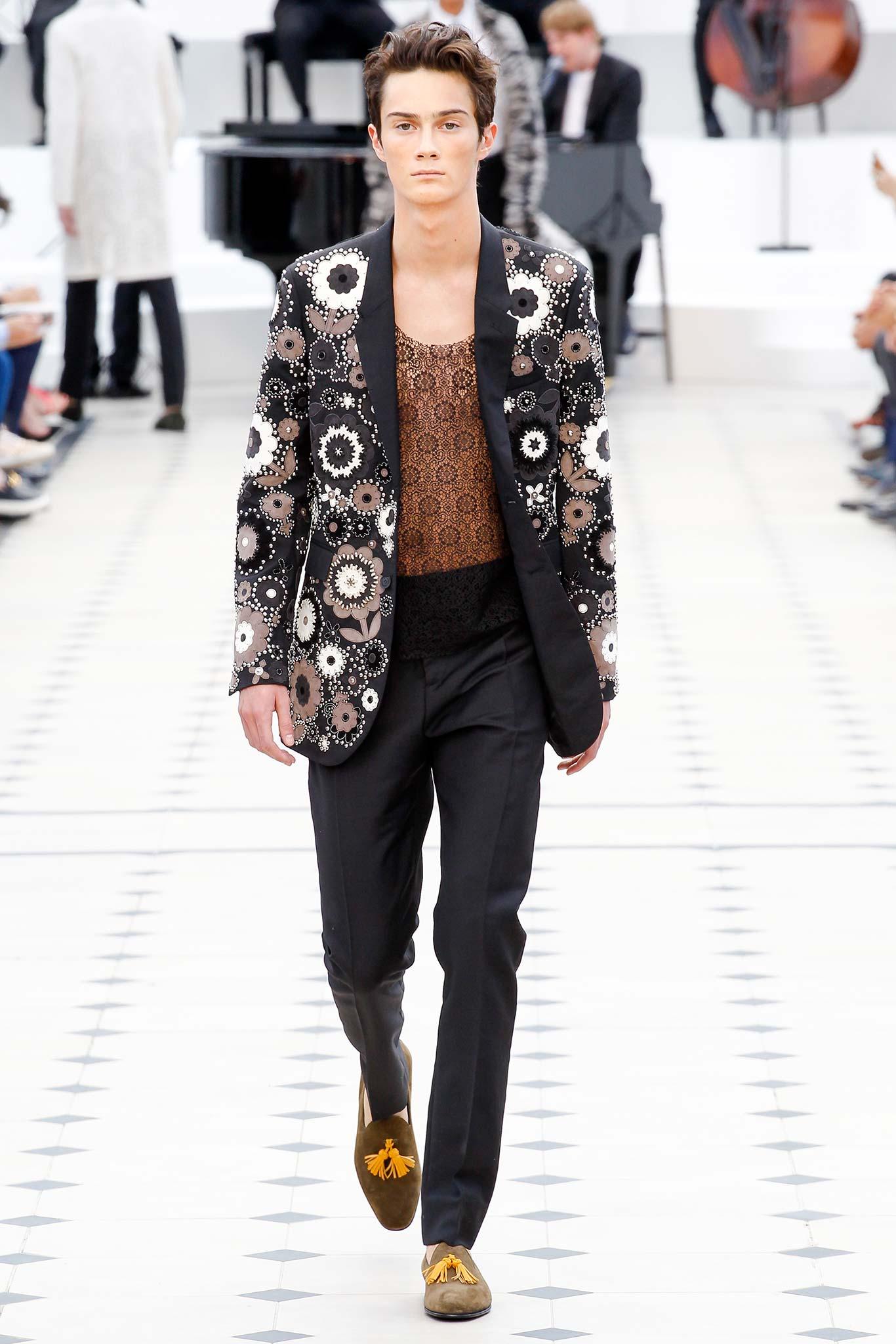 Burberry Prorsum Black & Multi-color wool Jacket from Christopher Bailey's Spring Summer 2016 menswear collection.
 Featuring studded and leather floral embellishments throughout, notched lapels, single slit pocket at chest, dual flap pockets at
