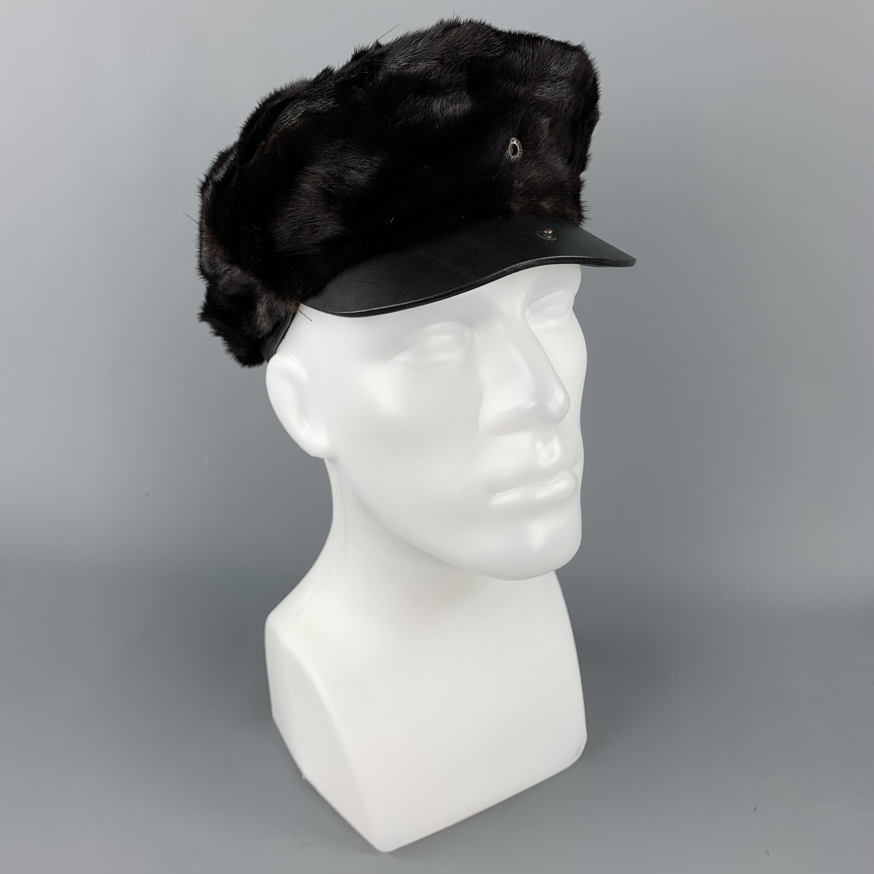 BURBERRY PRORSUM hat comes in a brown textured mink material, with a snap at brim, a solid black leather trim, and a quilted lining. As is. 

Very Good Pre-Owned Condition.
Marked: no size

Measurements:

Opening: 21.5 in.
Brim: 1.5 in.
Height: 3 in.