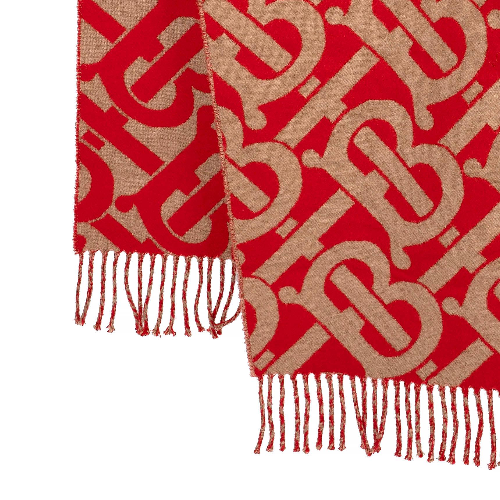 This 100% authentic Burberry TB monogram muffler is crafted from red and beige jacquard cashmere (please note the content tag is missing), offering a luxurious and soft feel. Featuring the iconic TB monogram design and finished with fringed ends,