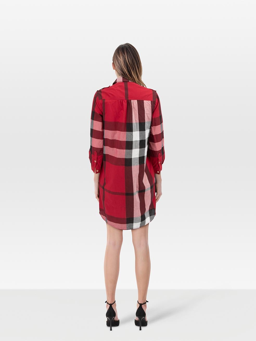 CONDITION is Very good. Minimal wear to dress is evident. Minimal wear to lower front left with minor pinholes in the fabric on this used Burberry designer resale item. Please note the dress is missing a belt.
 
 Details
 
 
 Red
 
 Cotton
 
 Shirt