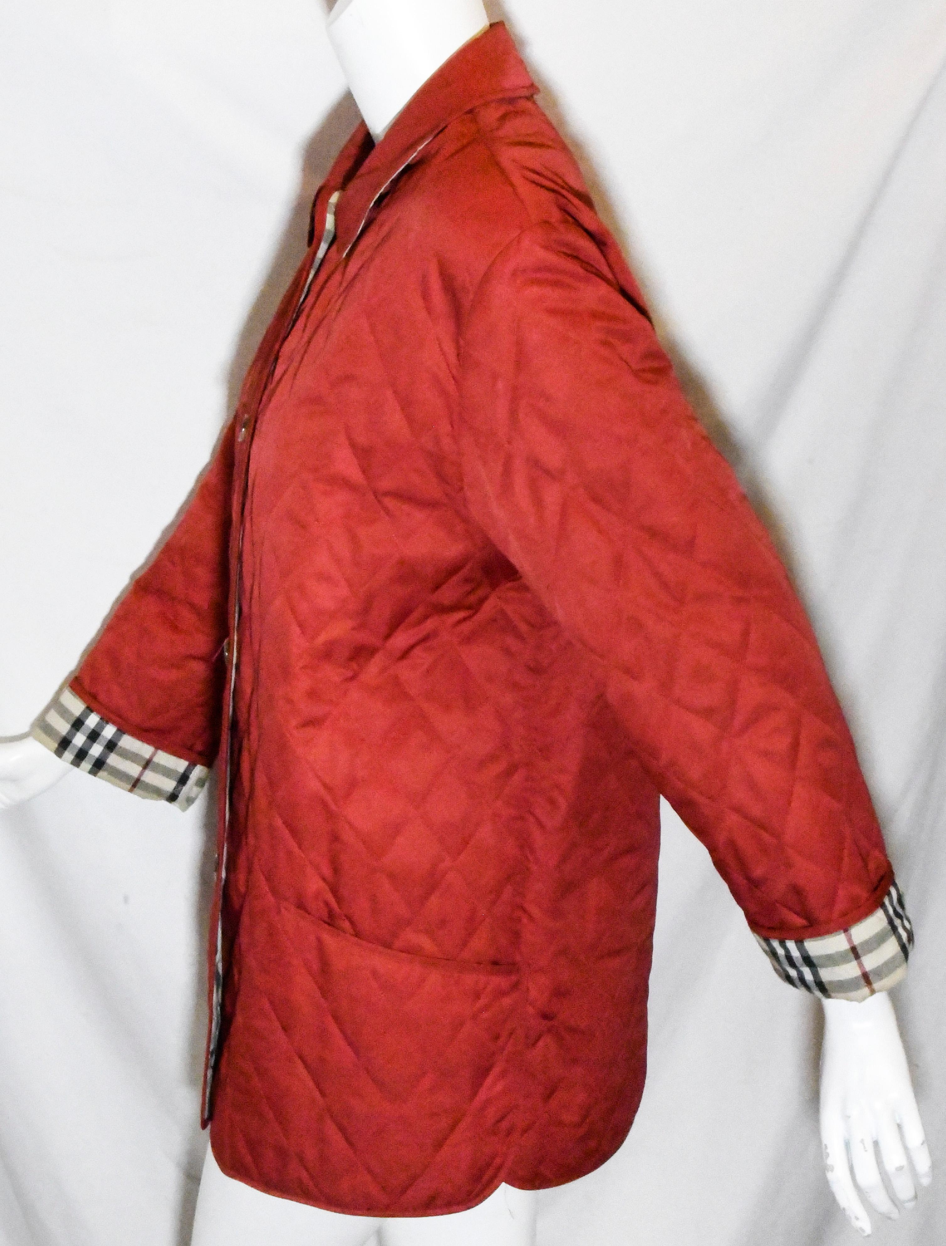 Burberry red diamond quilted jacket incorporates a boxy silhouette. The design is lined in our signature iconic check print.   Jacket is engineered with thermo regulation technology to accelerate evaporation and breathability, so you never feel too