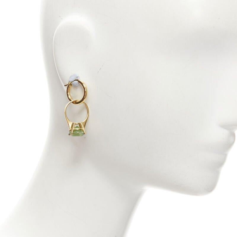 BURBERRY Riccardo Tisci gold green crystal ring hoop drop earrings pair
Reference: KEDG/A00247
Brand: Burberry
Designer: Riccardo Tisci
Material: Metal
Color: Green
Pattern: Solid
Closure: Pin
Extra Details: Rings pendant can be separated and worn