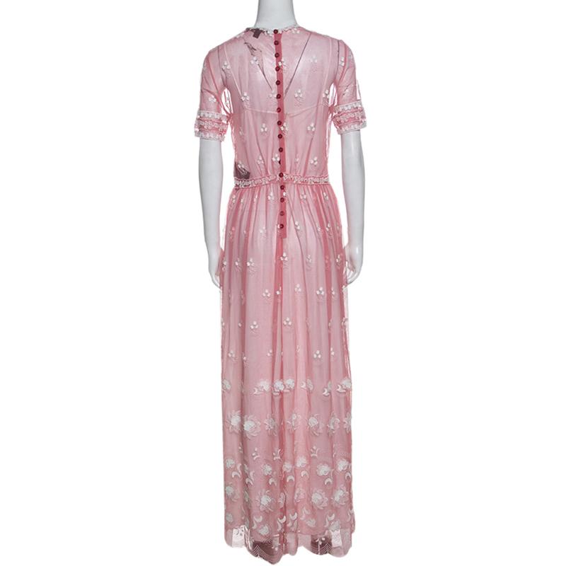 You cannot go wrong with a stunning dress like this one from the house of Burberry. This rose pink dress is utterly feminine and elegant with tulle accents and lovely embroidery all over. This pretty dress features a chic silhouette with short