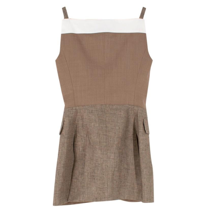 Burberry S/S 2020 Pecan Melange Wool Blend Waistcoat

-The cinched waist is inspired by corseted silhouettes from the Victorian era
- Fully lined
- Single-breasted closure flap pockets
- Buffalo horn buttons
- Can be worn as a mini dress

Body: 95%