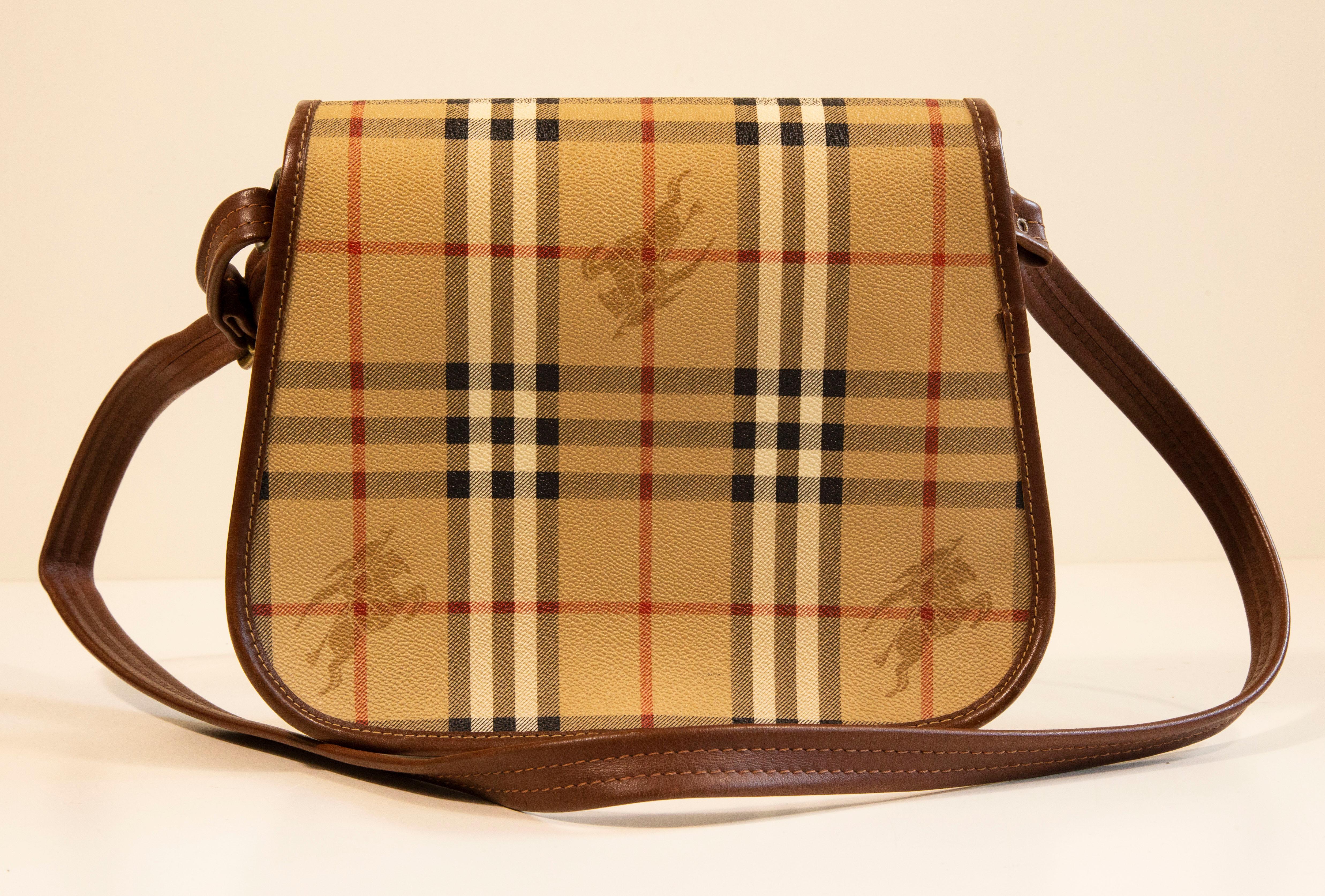 Brown Burberry Saddle Bag in Coated Canvas with the Burberry Classic Check Print For Sale