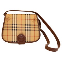 Vintage  Burberry Saddle Bag in Coated Canvas with the Burberry Classic Check Print