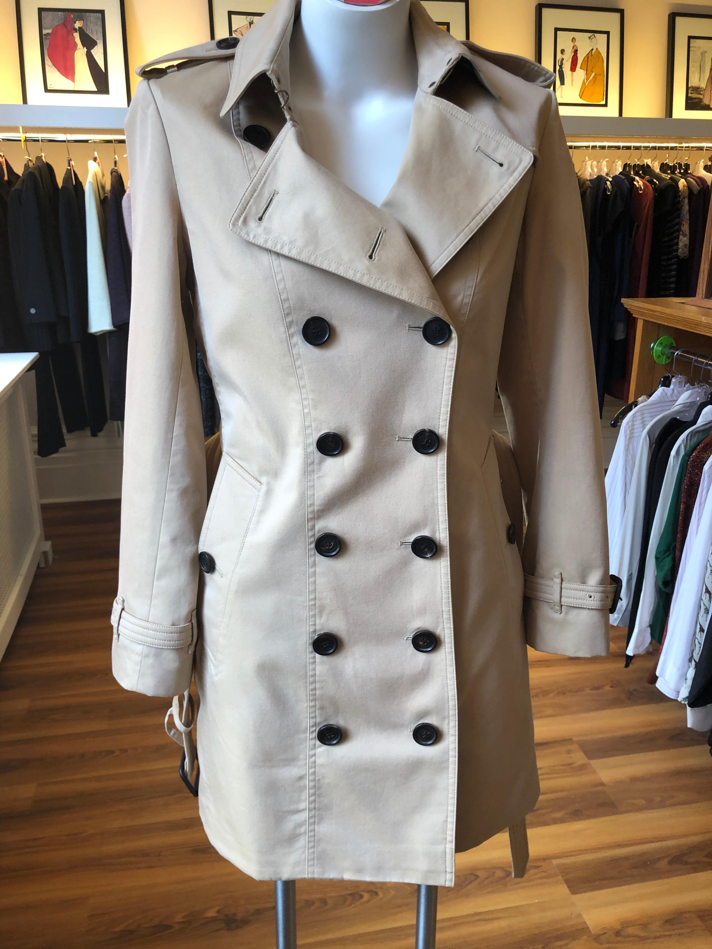 The Sandringham is one of the three Burberry Heritage Collection trench  coats. It is made of water repellent cotton gabardine. It is a tailored-fit trench coat which is cut to contour the body for a streamlined look. 
It is a classic all season
