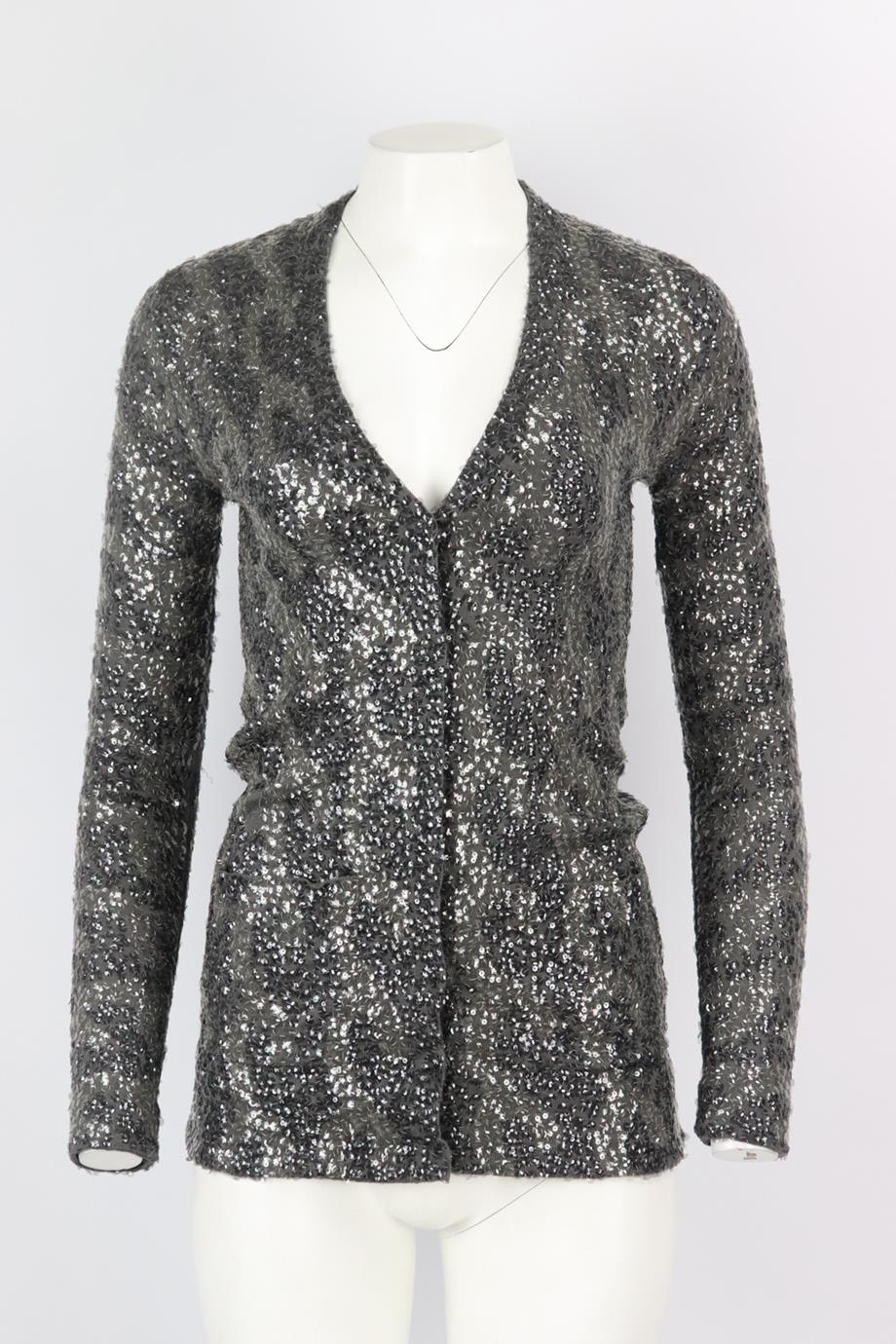 Burberry sequined wool cardigan. Grey. Long sleeve, v-neck. Button fastening at front. 100% Wool. Size: XSmall (UK 6, US 2, FR 34, IT 38). Bust: 30 in. Waist: 26 in. Hips: 32 in. Length: 29.5 in. Very good condition - Some sequins missing; see