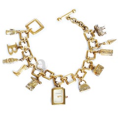 Burberry Signature Charm Bracelet Watch Gold Plated Sterling Silver Style BU5202