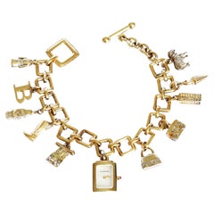 Burberry Signature Charm Bracelet Watch Gold Plated Sterling Silver Style BU5202