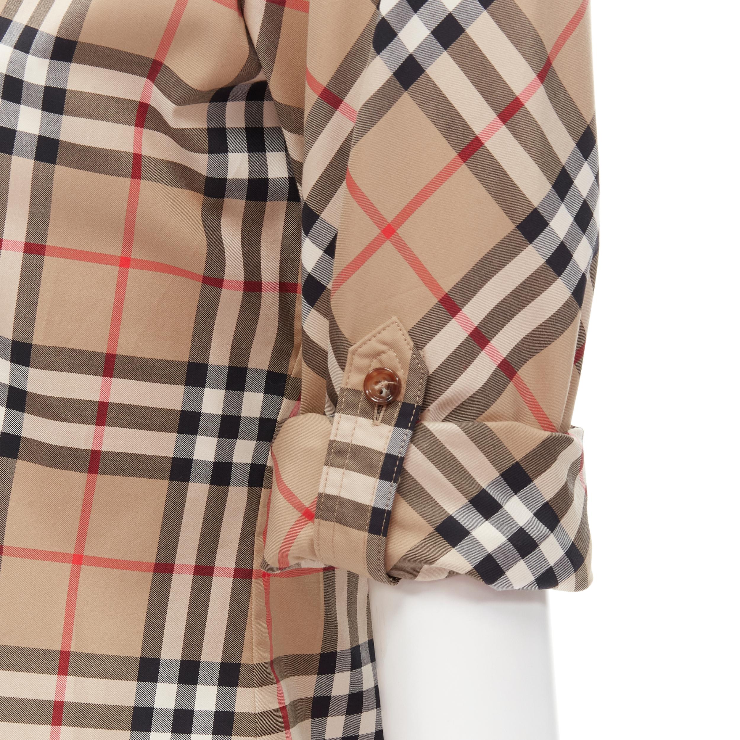 BURBERRY Signature House Check slim fit cotton long sleeve shirt XS 
Reference: ANWU/A00459 
Brand: Burberry 
Designer: Riccardo Tisci 
Collection: House Check 
Material: Cotton 
Color: Brown 
Pattern: Check 
Closure: Button 
Extra Detail: Fit dart