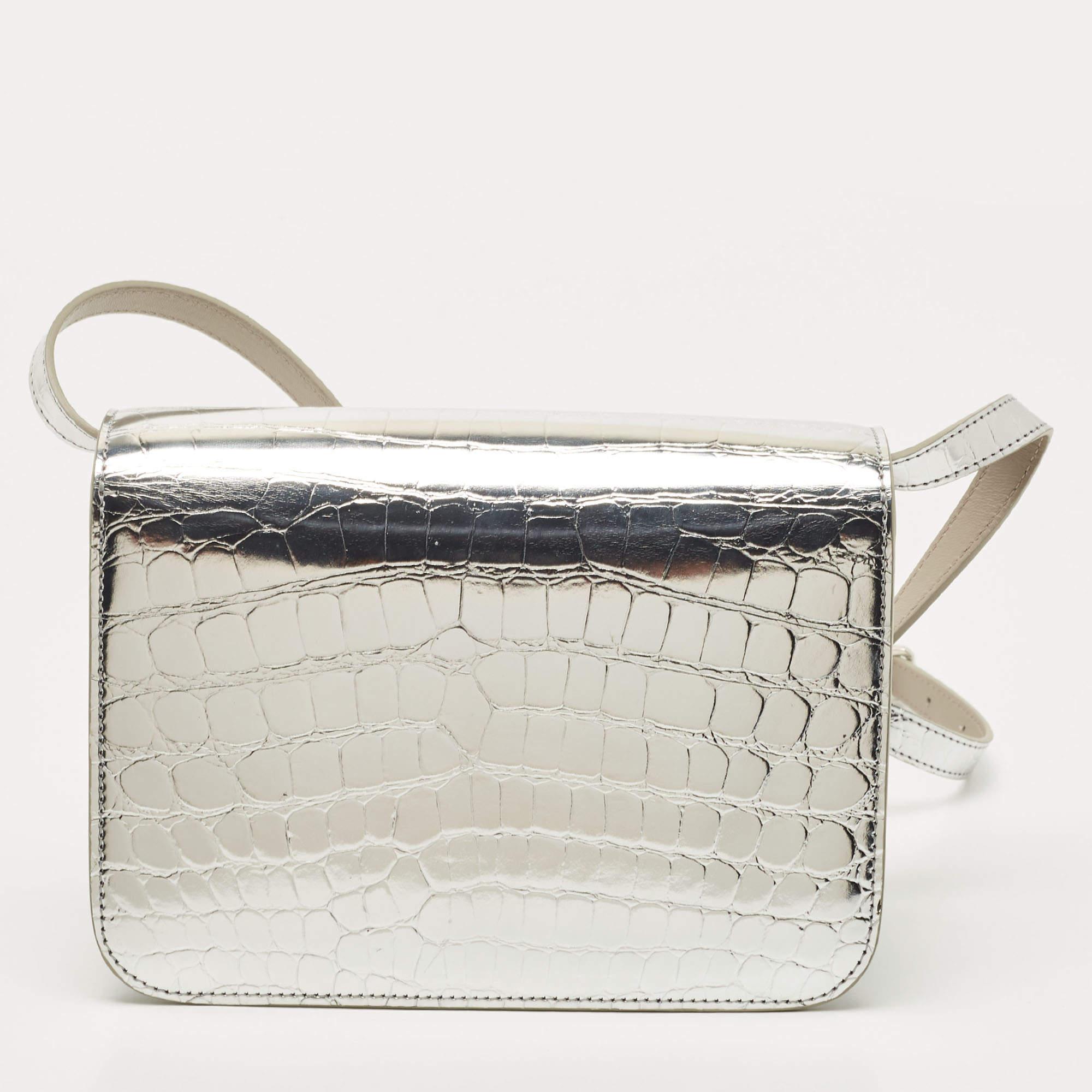 Burberry's leather shoulder bag is a knowing investment piece that's on-trend now, too. It's finished with an elegant silver-tone metal TB clasp as well as an adjustable shoulder strap, so it can be worn in a number of different ways. With more room