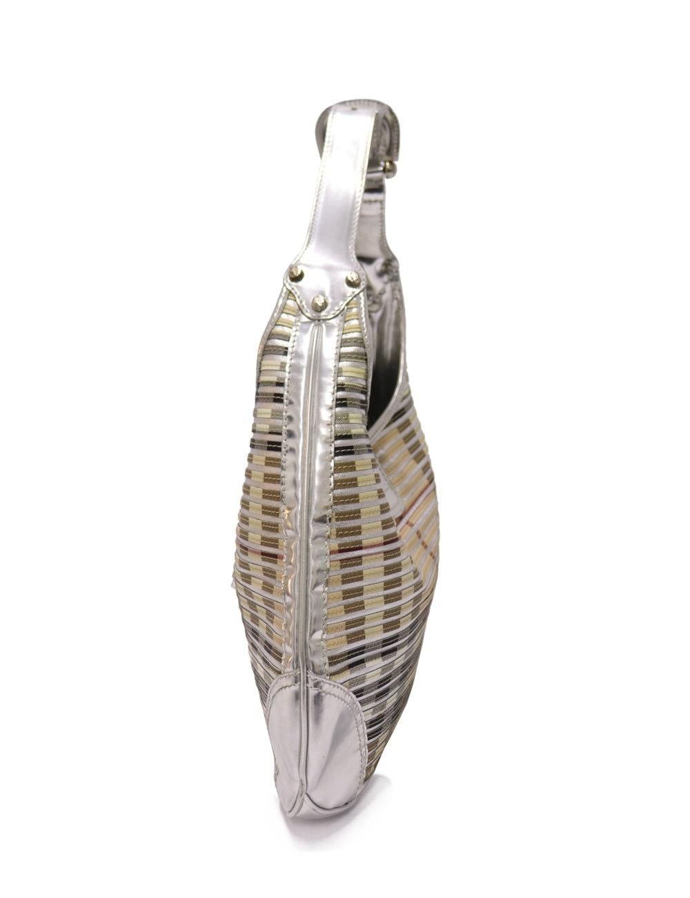 Burberry Silver Metallic Striped shoulder bag.

Additional information:
Material: Leather
Hardware: Silver
Measurements: 41 L x 7 D x 26 H cm
Handle Drop: 26 cm
Overall condition: Excellent
Interior Condition: Signs of use
Exterior Condition: A