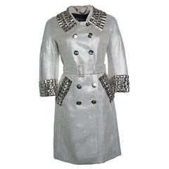 Burberry, silver metallic trench coat with giant studs