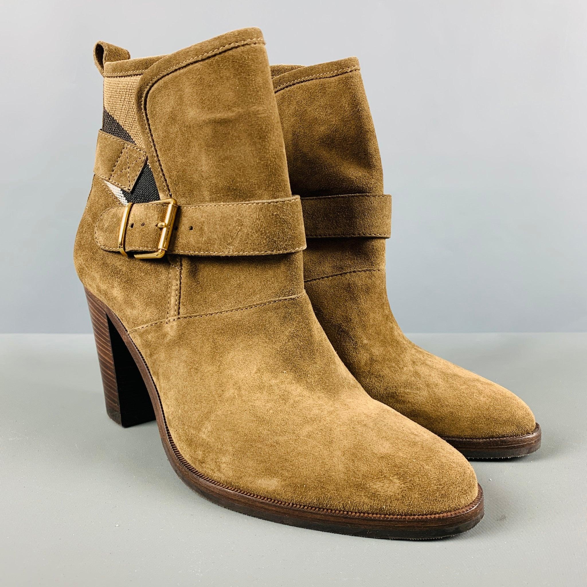 BURBERRY boots comes in a khaki suede with a plaid trim featuring a double strap buckle closure and a chunky heel. made in ItalyVery Good Pre-Owned Condition. 

Marked:   ITCALFAR14CHI 

Measurements: 
  Length: 9.5 inches Width: 3.75 inches Height: