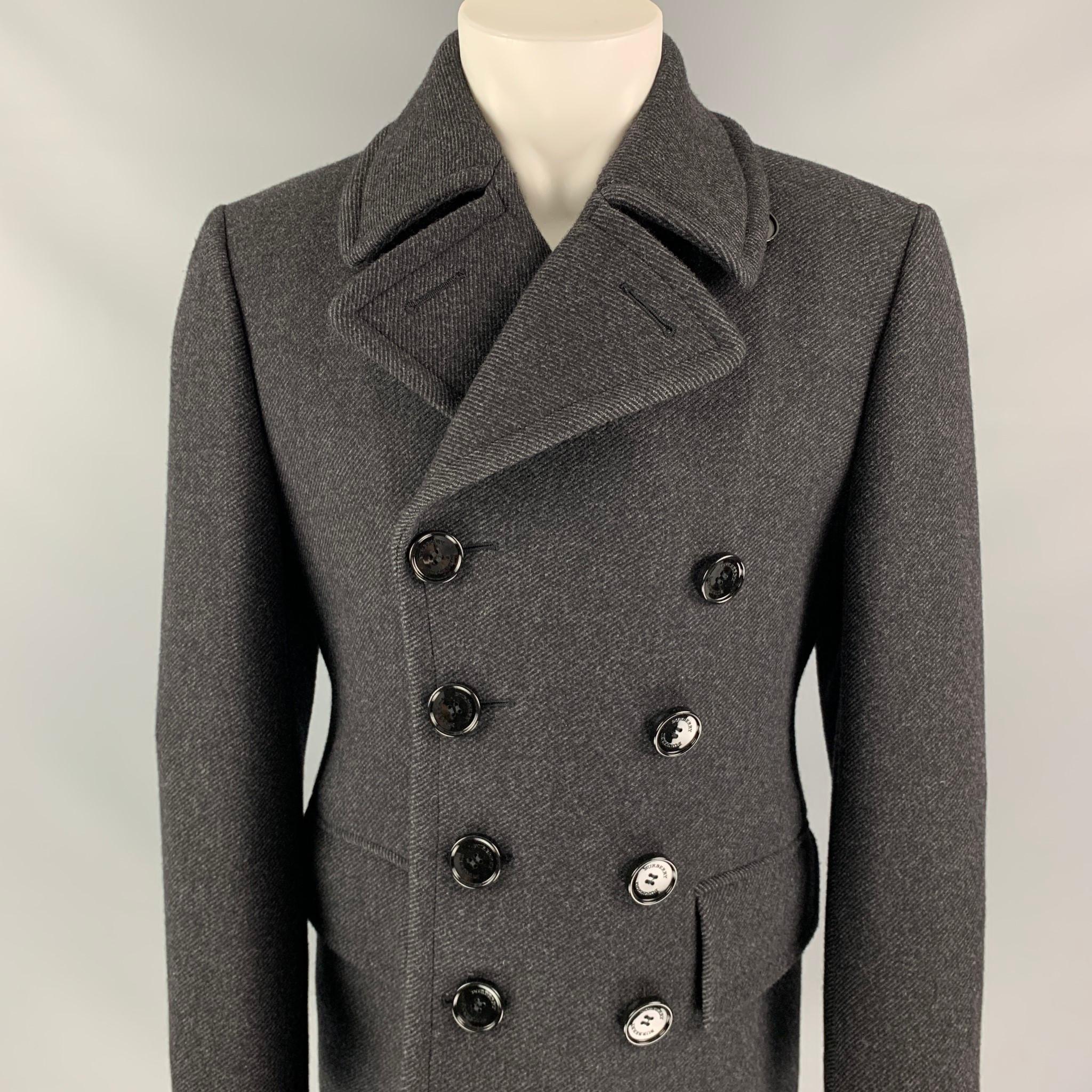 Early Burberry Prorsum by Christopher Bailey Grey Virgin Wool Peacoat Jacket. Double Breasted, Flap Pockets, Collar and Lined.

Excellent Pre-Owned Condition. No visible signs of wear.
Marked: M  US38, IT48

Measurements:

Chest: 41 in.
Shoulder: