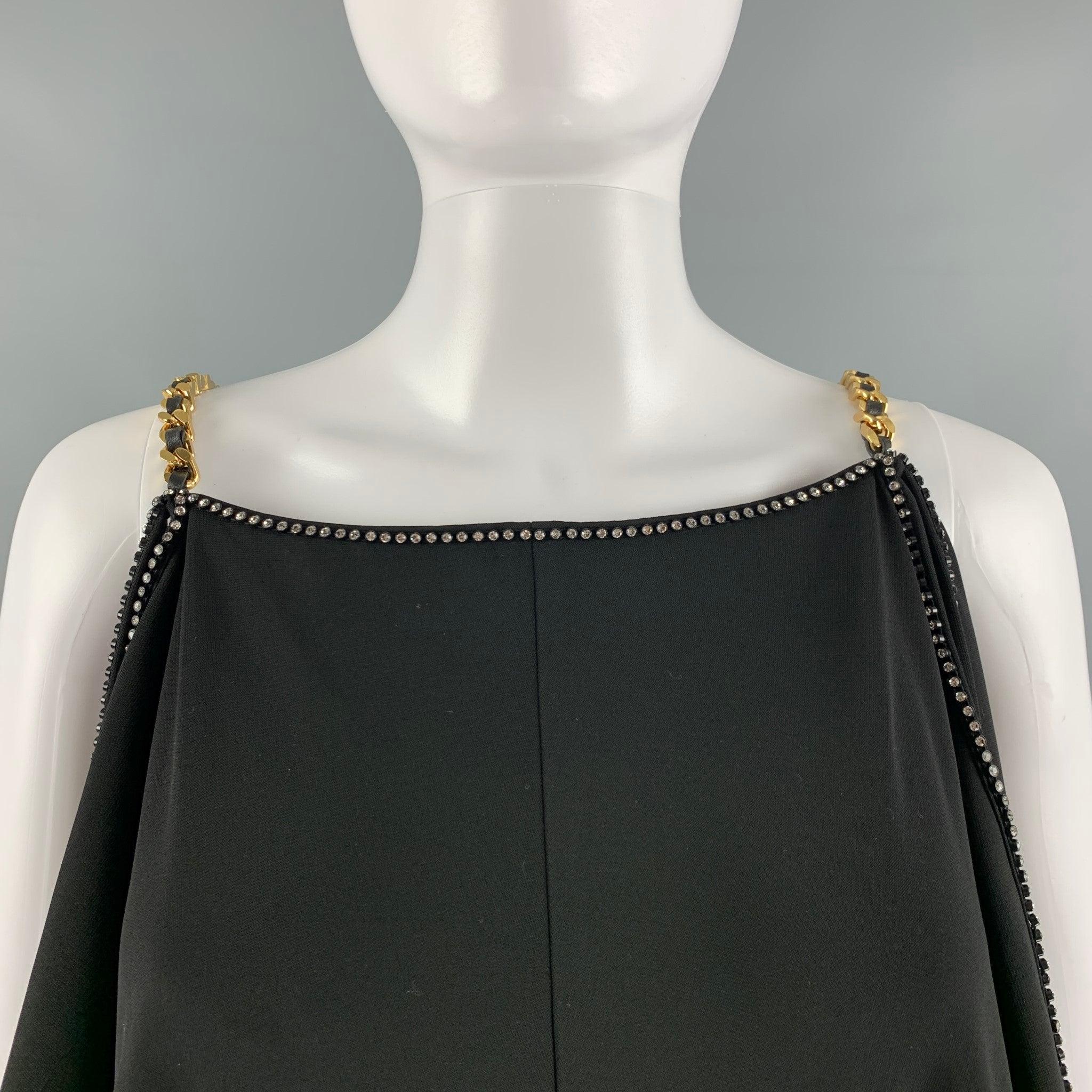 BURBERRY long dress comes in a black viscose elastane knit material featuring a chain gold tone shoulder strap, rhinestones accents, and a front slit. Made in Italy.New with Tags. 

Marked:   4 

Measurements: 
  Bust: 44 inches Waist: 42 inches