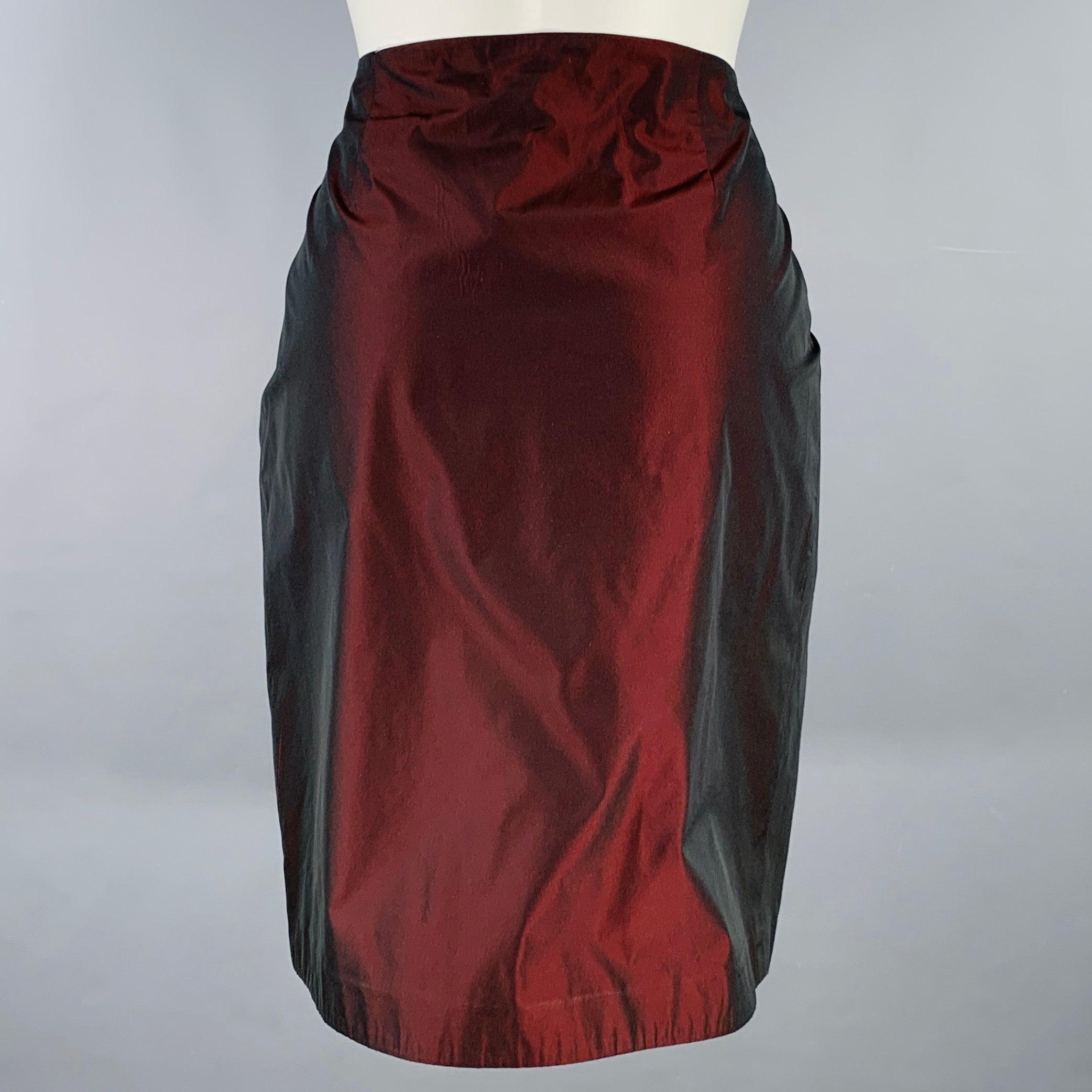 BURBERRY skirt
in a burgundy polyester taffeta featuring a pleated style, and side zipper closure. Made in Italy.Excellent Pre-Owned Condition. 

Marked:   UK 6 

Measurements: 
  Waist: 30 inches Hip: 38 inches Length: 20.5 inches 
  
  
 
Sui